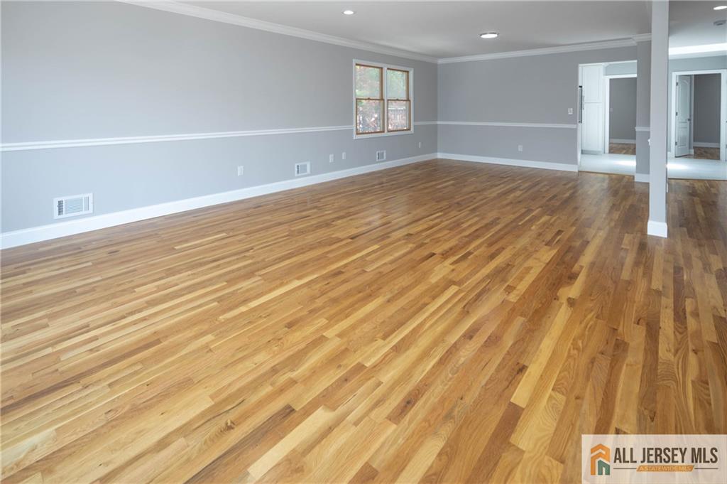 278 Rector Street Perth Amboy, NJ 08861 - Photo 17 of 47 wooden floor in an empty room