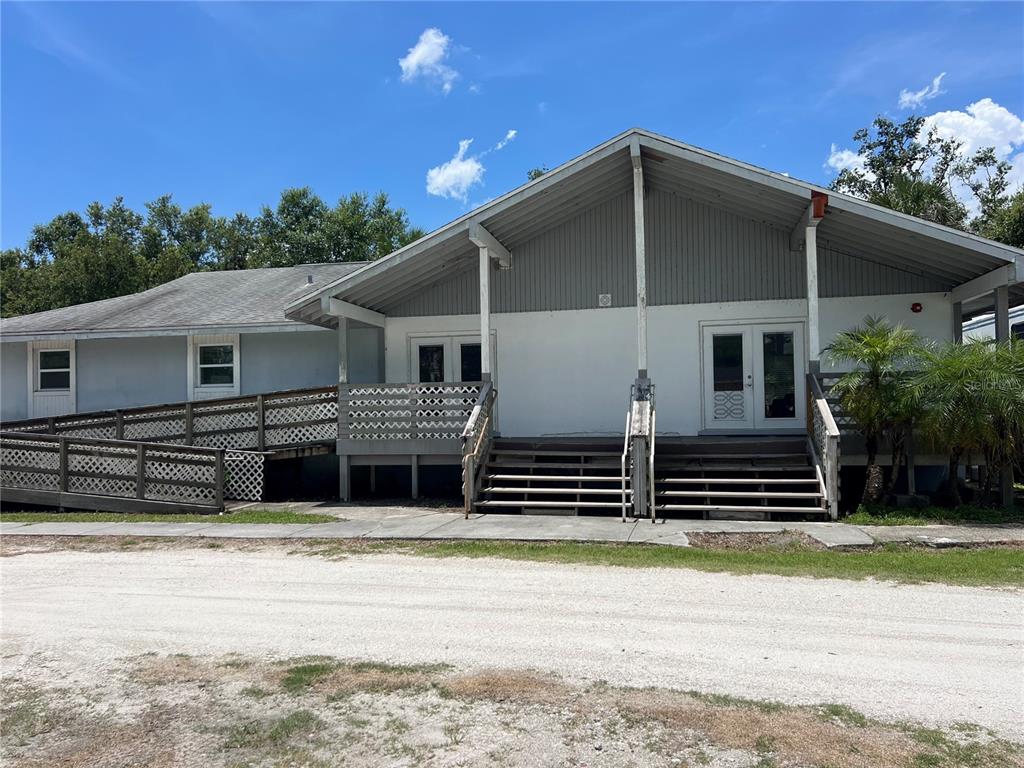 8806 Southwest Start Center Street Arcadia, FL 34269 - Photo 20 of 21 a house with trees in the background