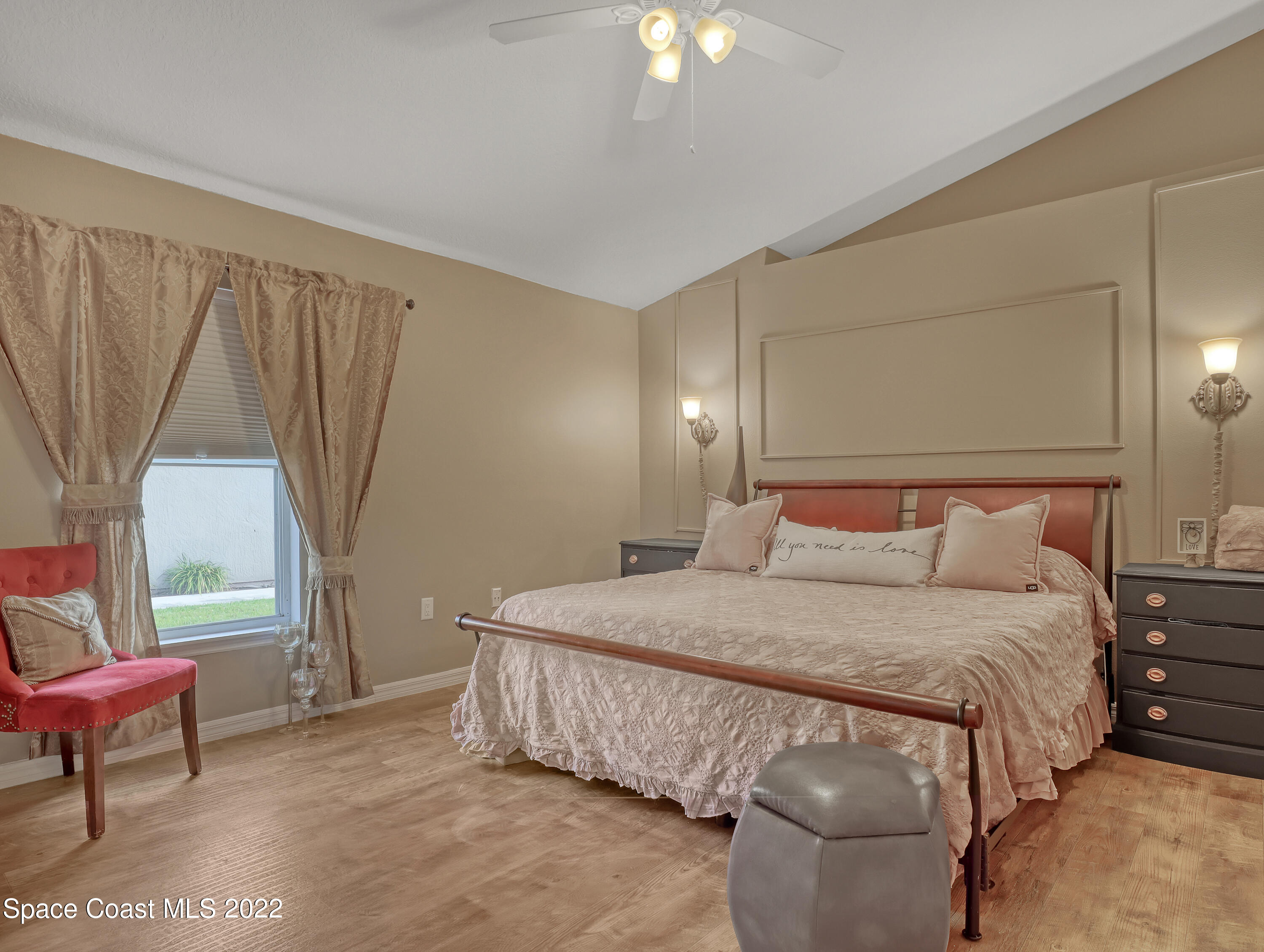 3935 Orion Way Rockledge, FL 32955 - Photo 16 of 30 a bedroom with a bed and a window