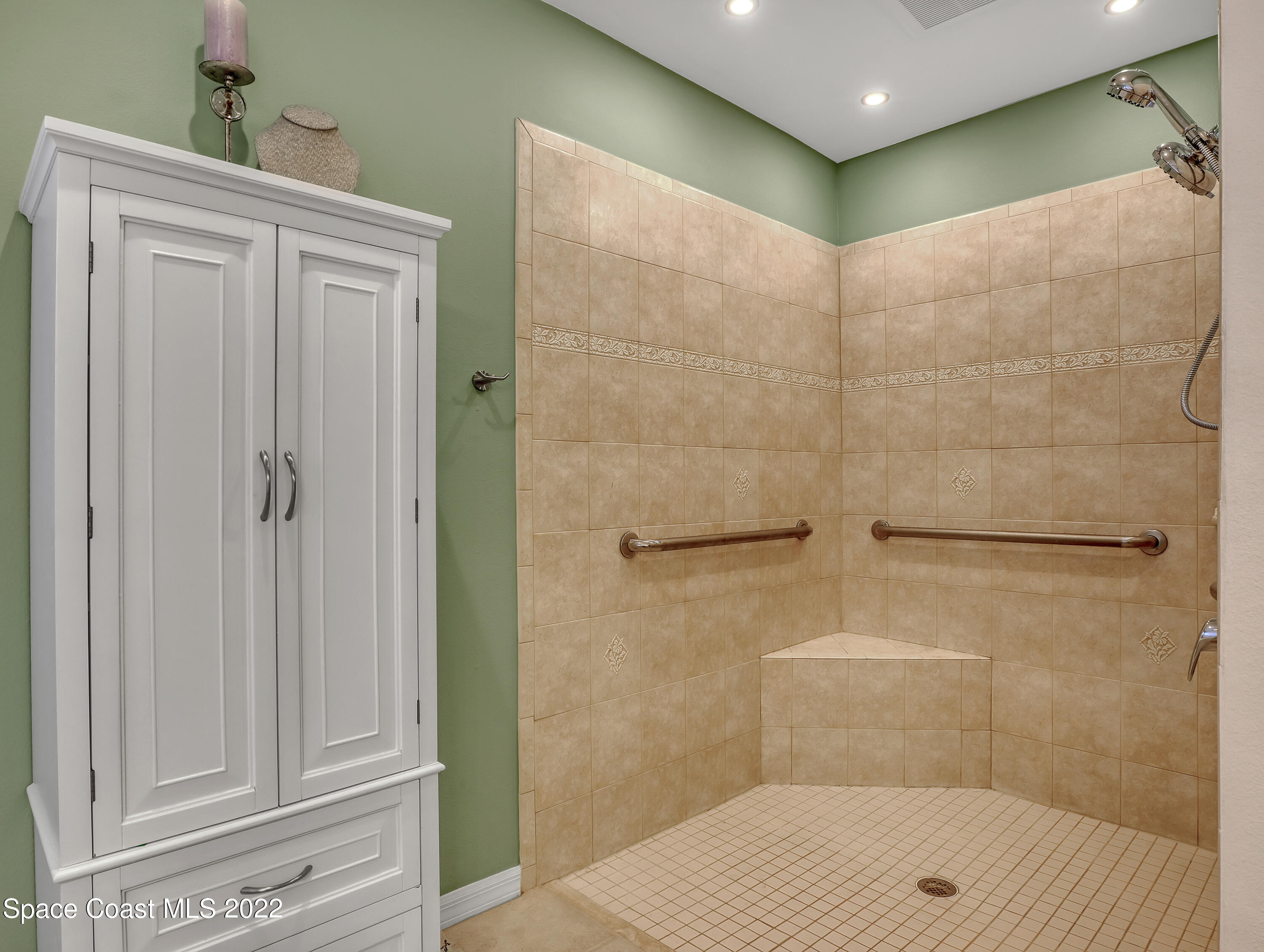 3935 Orion Way Rockledge, FL 32955 - Photo 20 of 30 a bathroom with a shower and a sink
