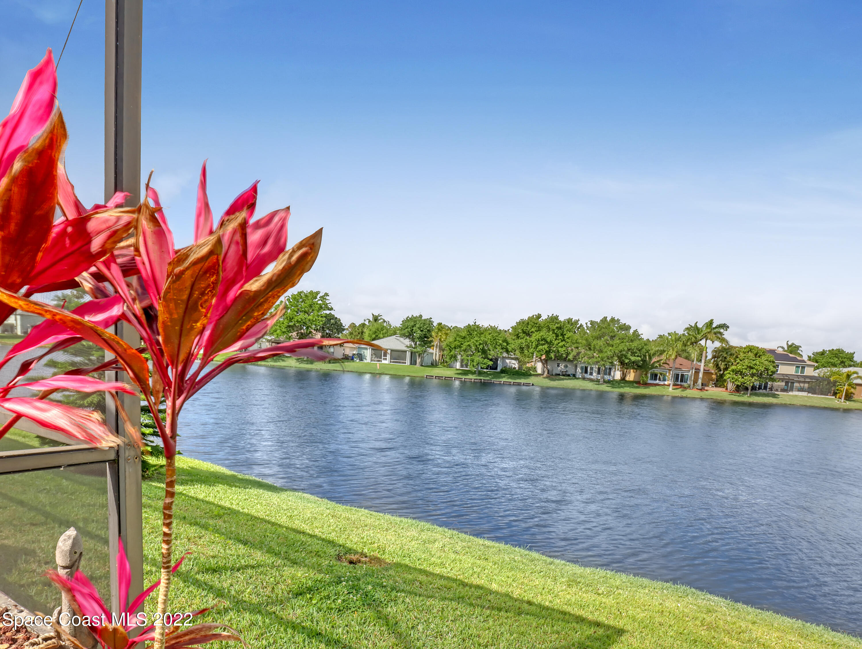 3935 Orion Way Rockledge, FL 32955 - Photo 30 of 30 a view of a lake with a large trees