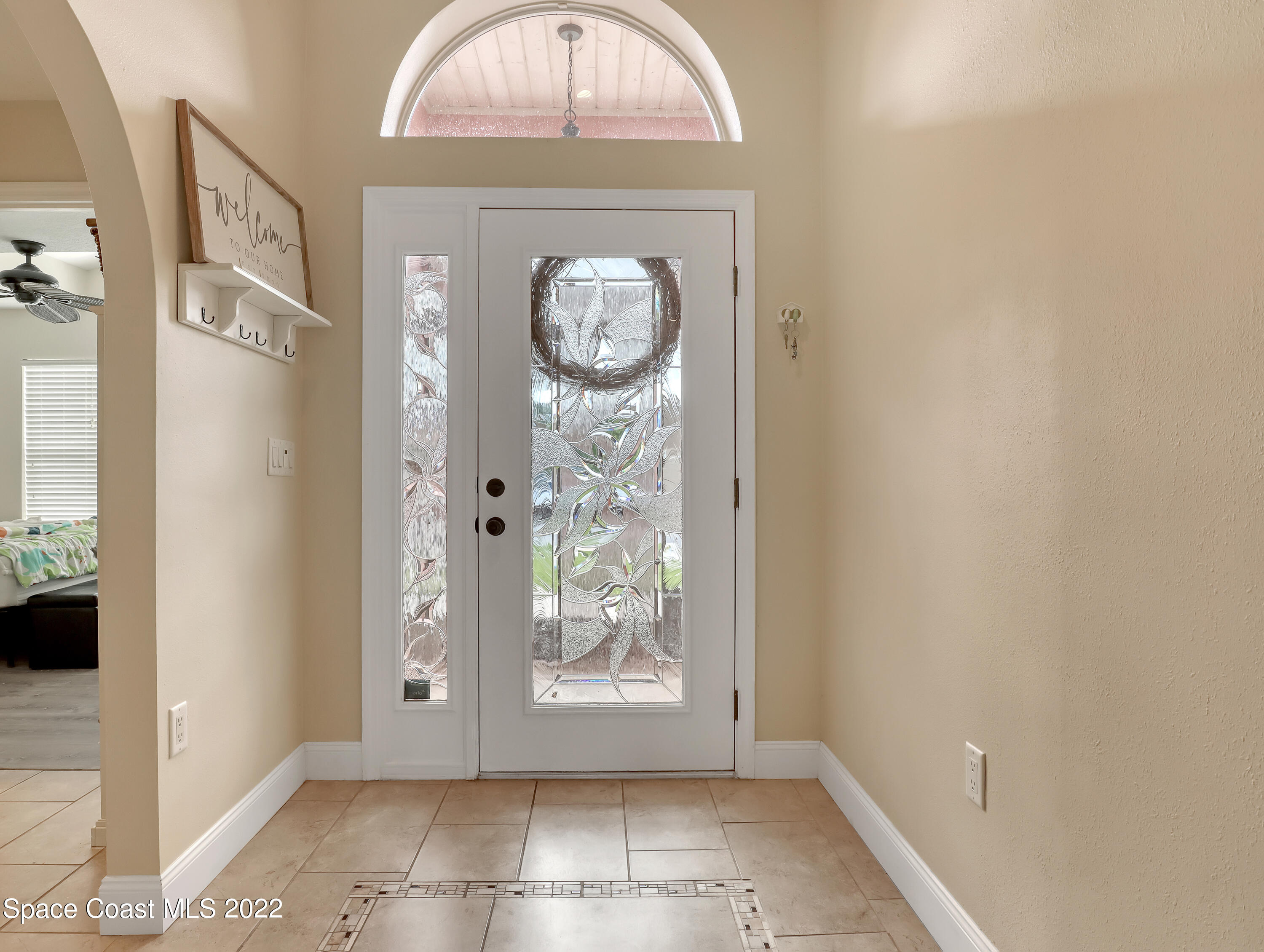3935 Orion Way Rockledge, FL 32955 - Photo 6 of 30 a view of a hallway with windows