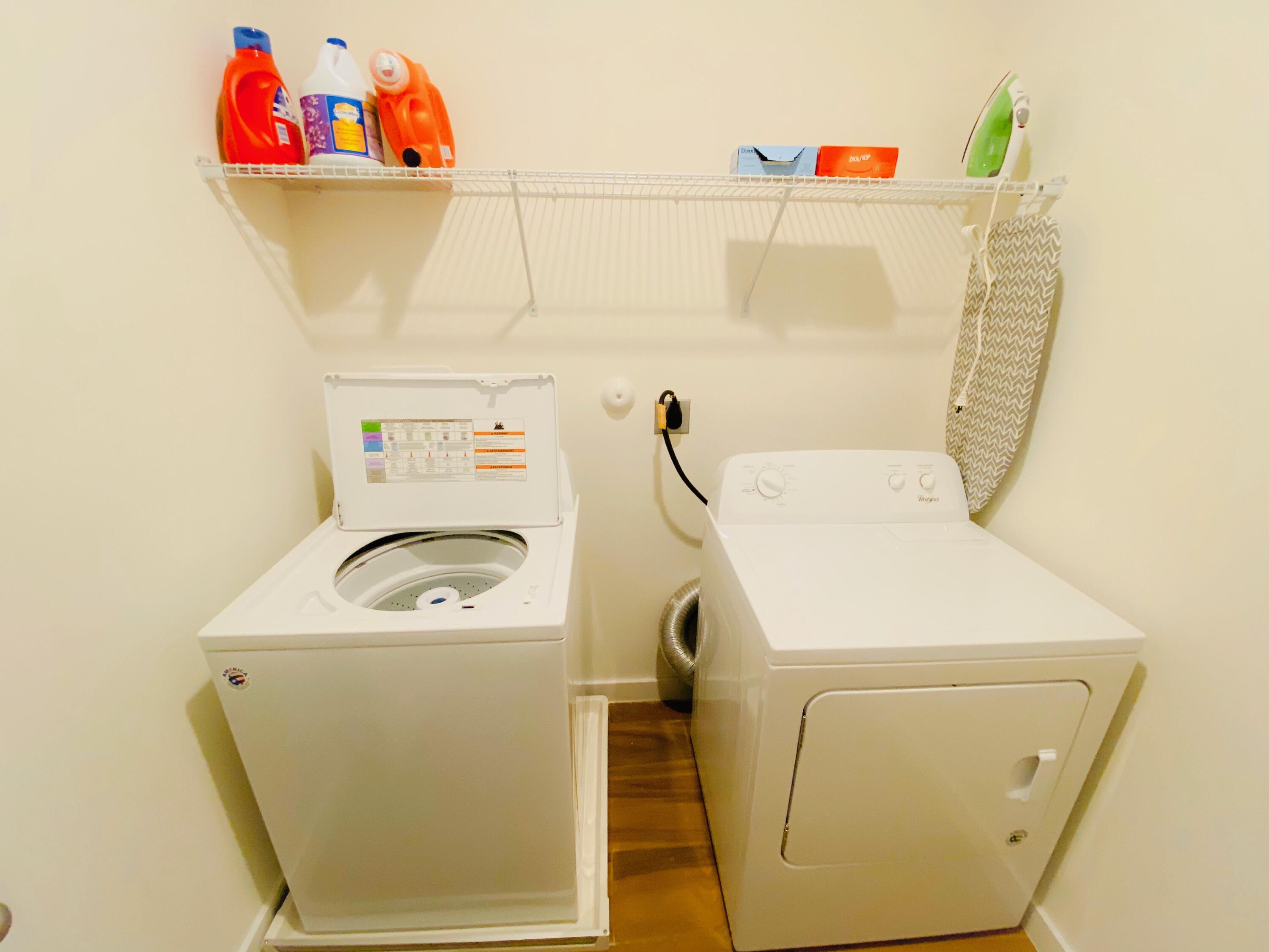 103 Osprey Circle Hypoluxo, FL 33462 - Photo 19 of 27 a utility room with dryer and washer