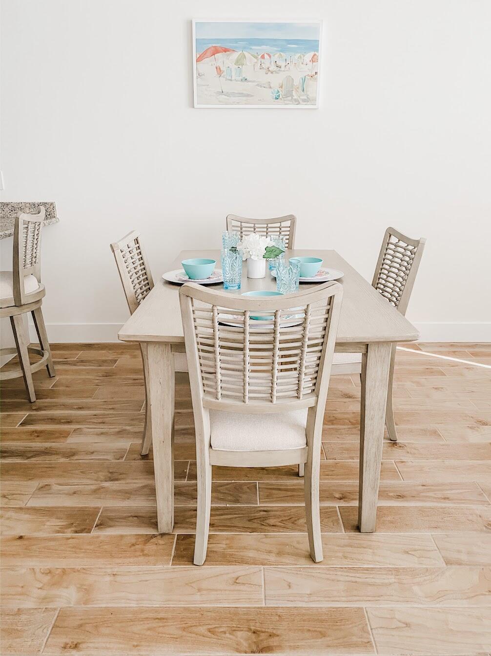 103 Osprey Circle Hypoluxo, FL 33462 - Photo 8 of 27 a view of a dining room with furniture