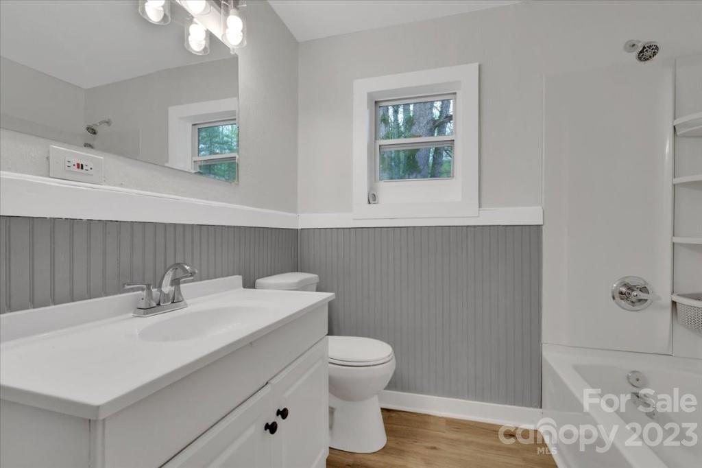 62 Kinard Lane Penrose, NC 28766 - Photo 13 of 25 a bathroom with a sink toilet and mirror