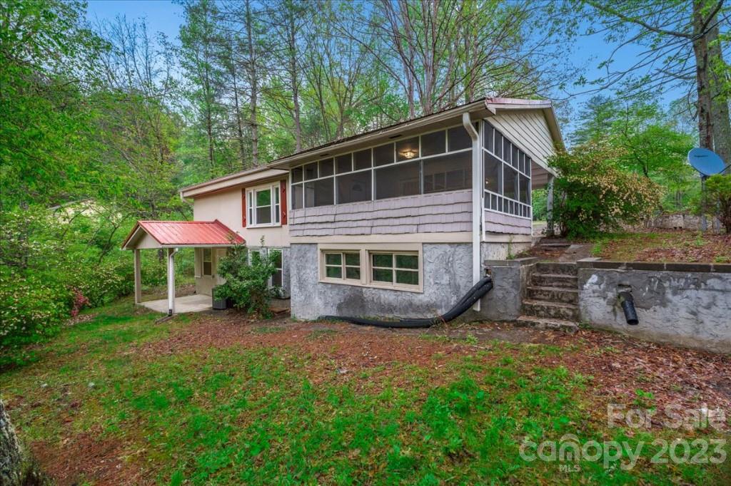 62 Kinard Lane Penrose, NC 28766 - Photo 24 of 25 a view of a house with a yard