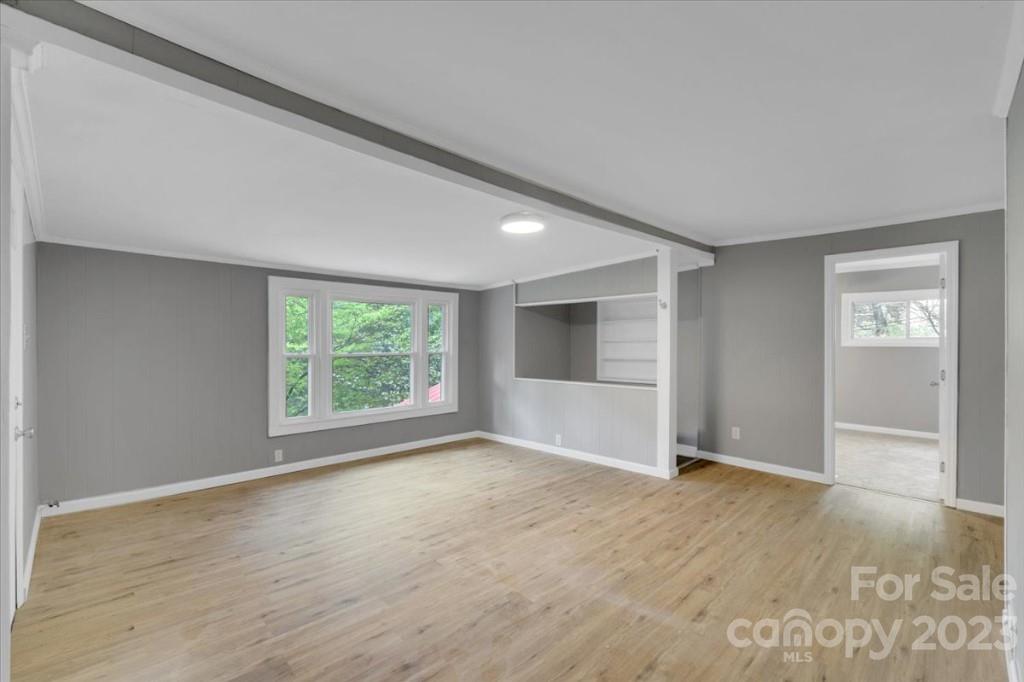 62 Kinard Lane Penrose, NC 28766 - Photo 7 of 25 an empty room with windows and closet