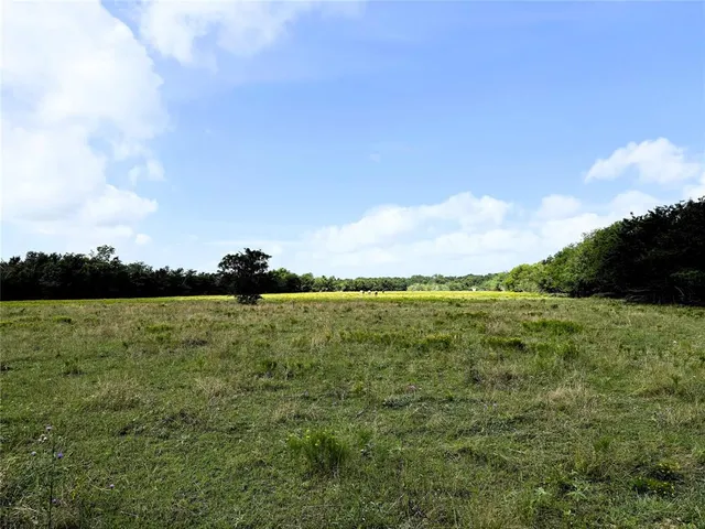 a view of a lake and mountain in the back
