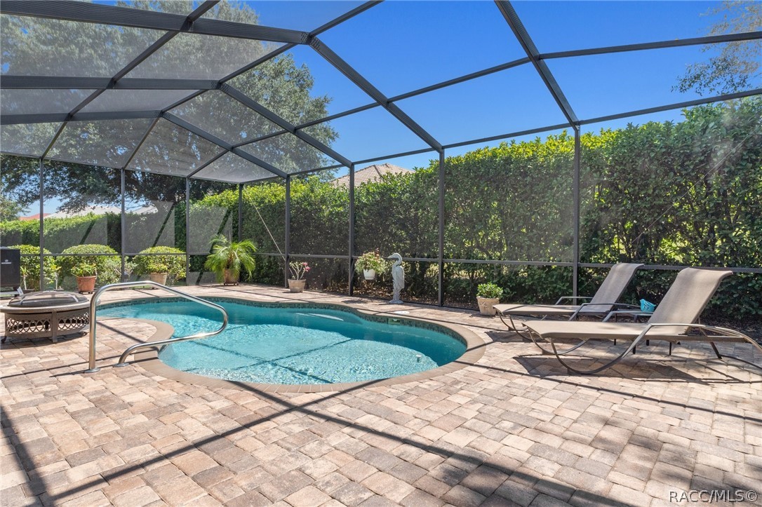 2015 North Rhodes Point Hernando, FL 34442 - Photo 35 of 82 The pool deck provides plenty of room for lounge chairs , tables, or other seating areas. It's a great spot for entertaining.