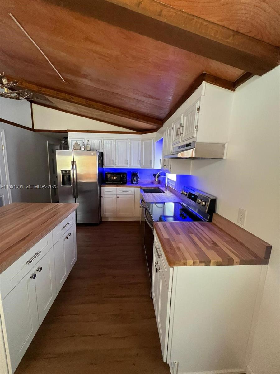 123 Rocky Road Lackawaxen, PA 18435 - Photo 12 of 39 a kitchen with stainless steel appliances granite countertop a sink counter space and cabinets