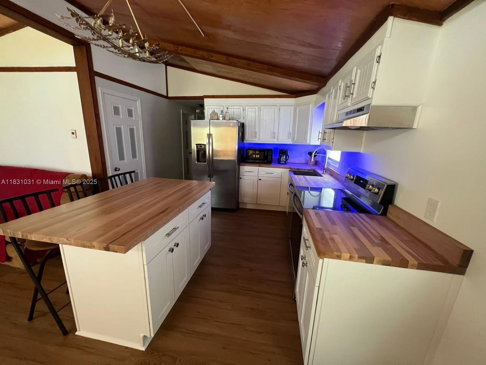 123 Rocky Road Lackawaxen, PA 18435 - Photo 19 of 39 a open kitchen with stainless steel appliances granite countertop a sink stove and cabinets
