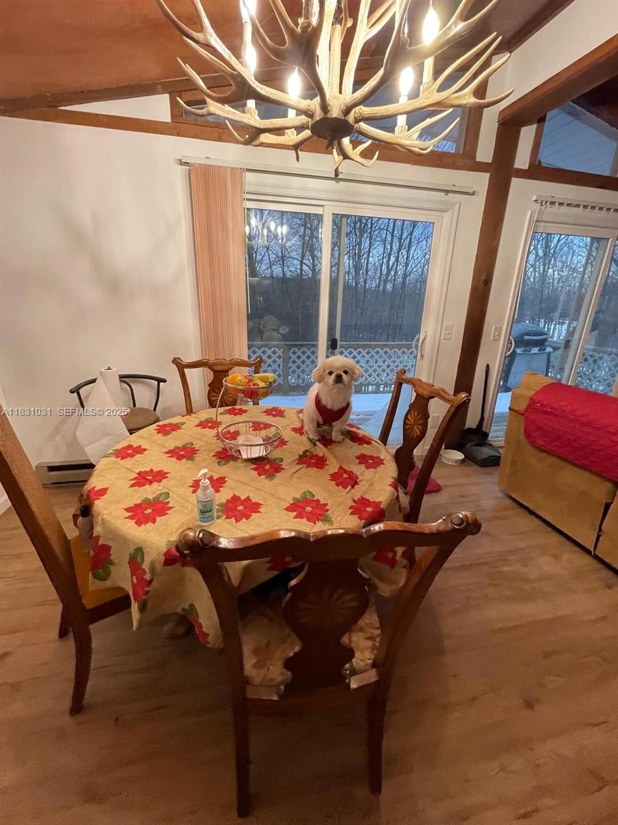 123 Rocky Road Lackawaxen, PA 18435 - Photo 34 of 39 a bed sitting in a bedroom next to a window