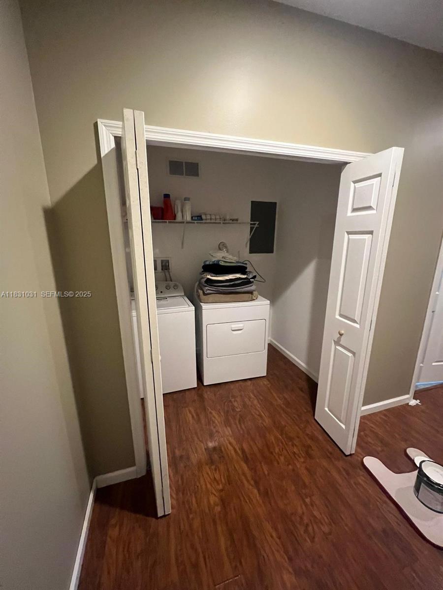 123 Rocky Road Lackawaxen, PA 18435 - Photo 38 of 39 a kitchen with wooden floors and white appliances