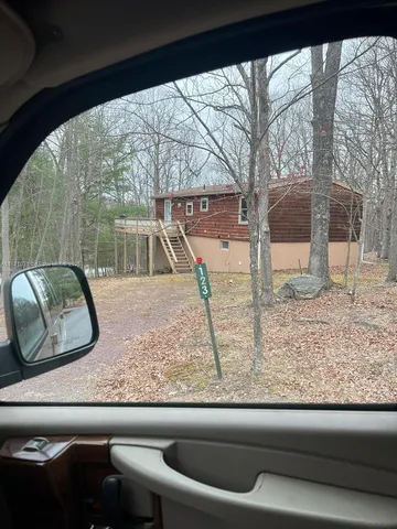a view of a living room and a window