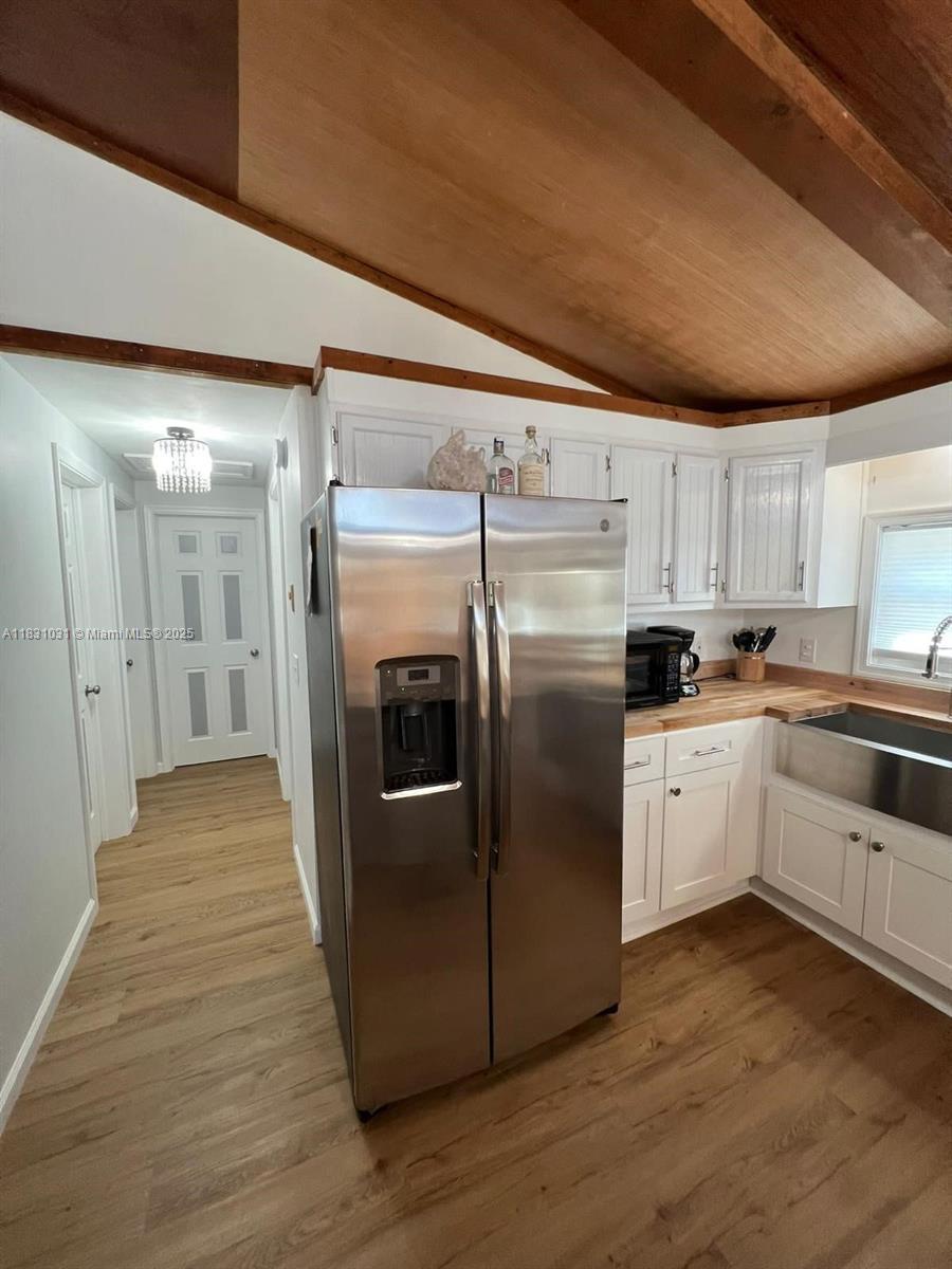 123 Rocky Road Lackawaxen, PA 18435 - Photo 6 of 39 a kitchen with stainless steel appliances a refrigerator and a stove
