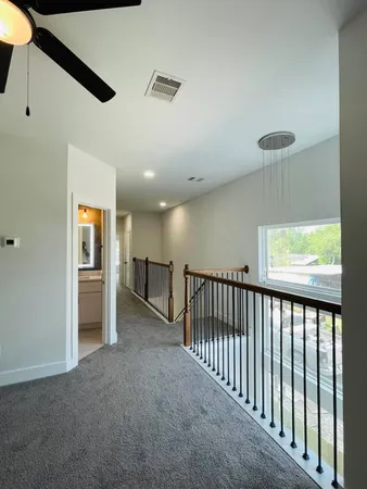 a view of hallway with livingroom