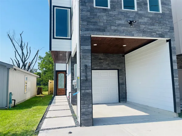 a picture of a house with a yard