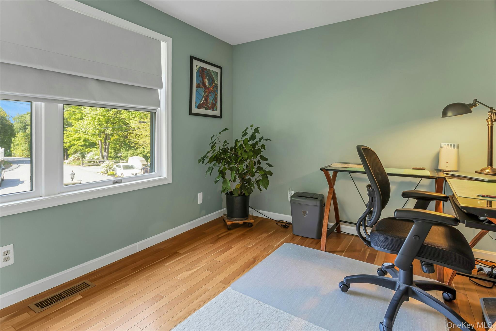 340 Osceola Road Jefferson Valley, NY 10535 - Photo 25 of 48 a view of a workspace with furniture and a window