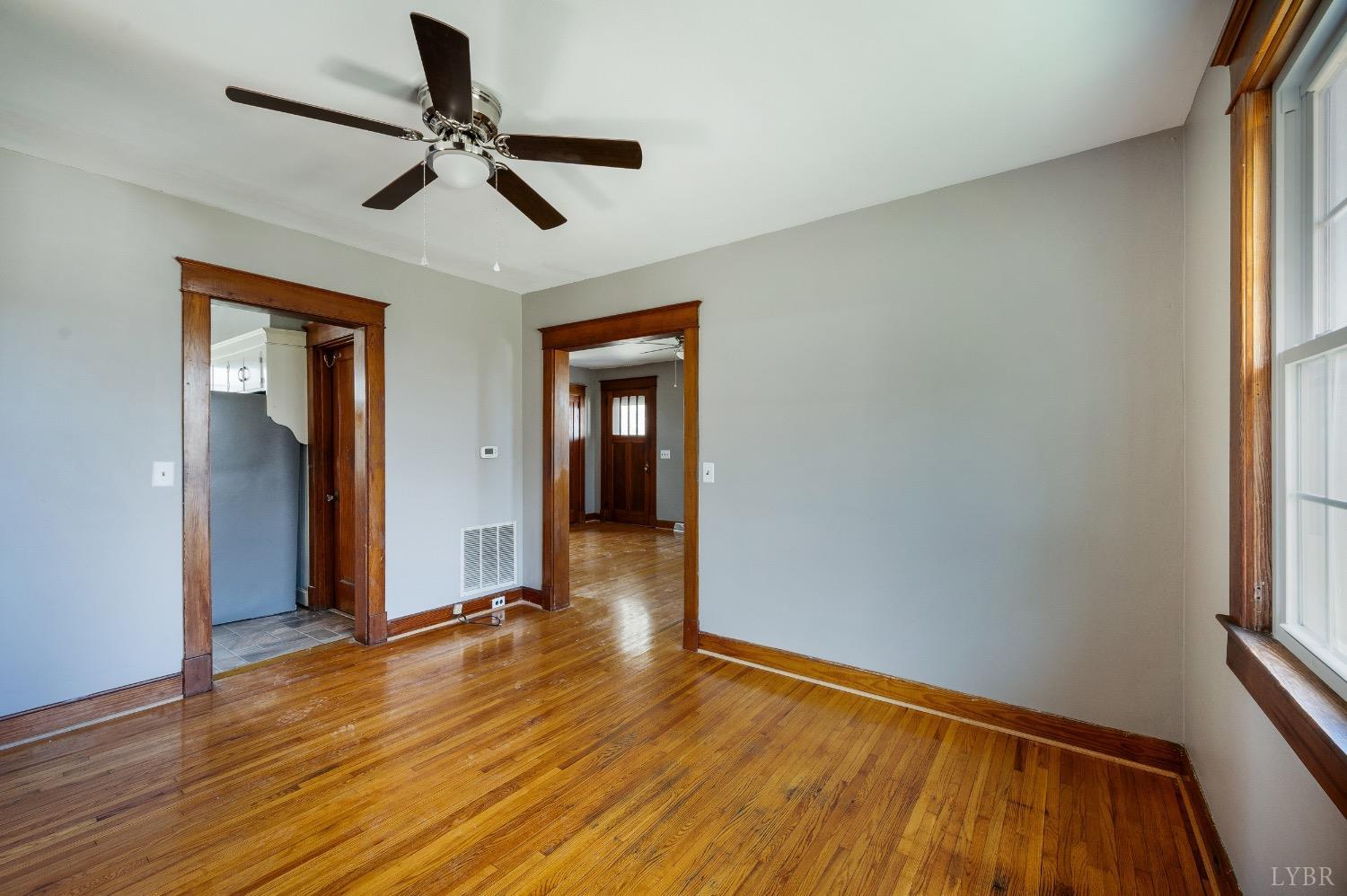 501 West Spencer Road Hurt, VA 24563 - Photo 12 of 55 wooden floor in an empty room with a window