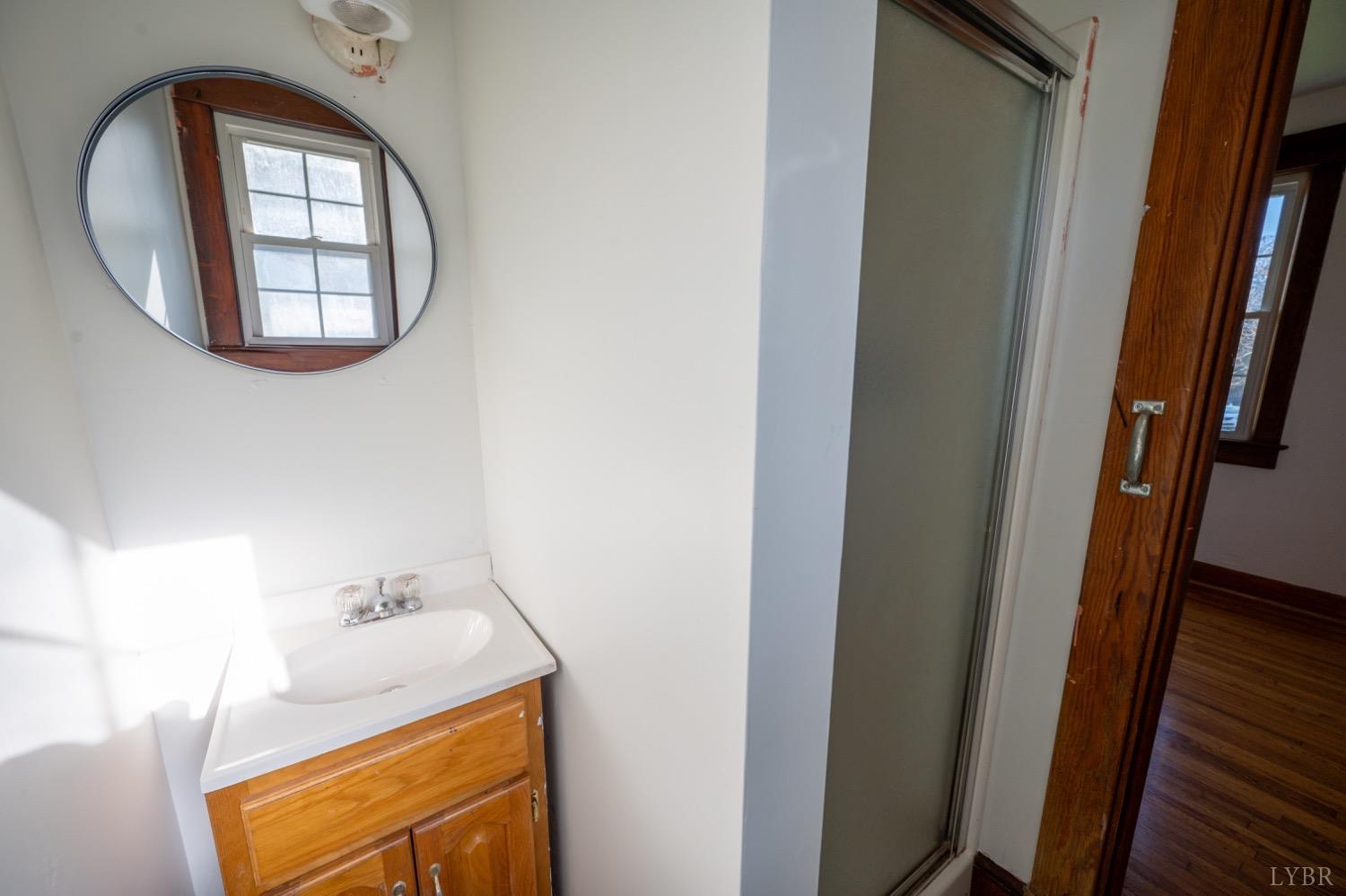 501 West Spencer Road Hurt, VA 24563 - Photo 24 of 55 a bathroom with a sink and a mirror