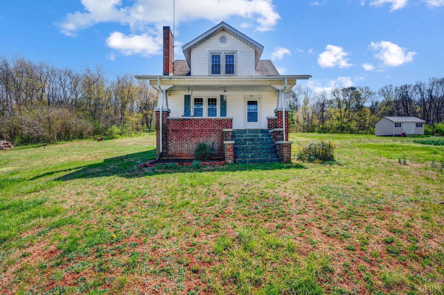 501 West Spencer Road Hurt, VA 24563 - Photo 3 of 55 a view of a house with backyard and garden