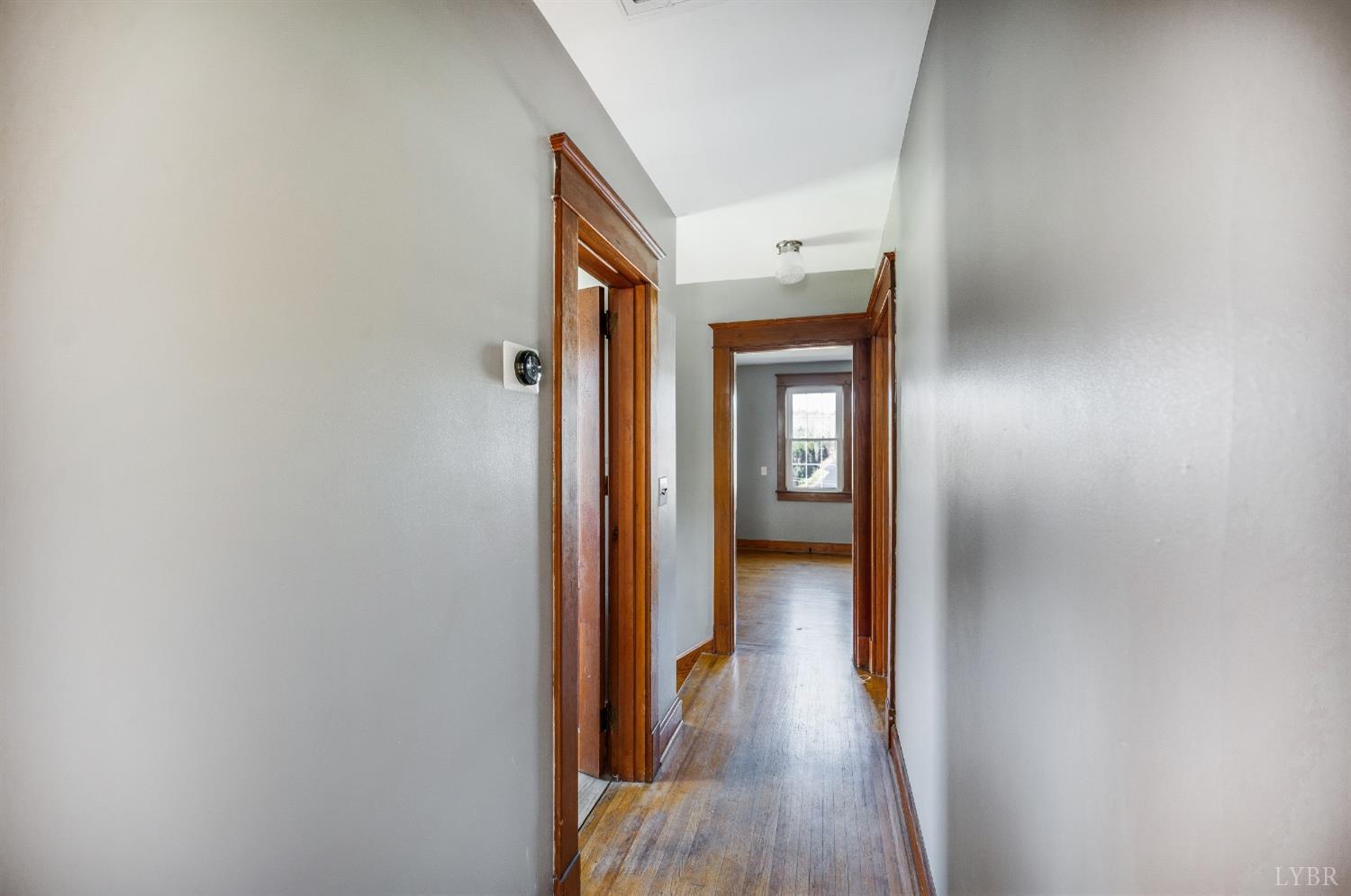 501 West Spencer Road Hurt, VA 24563 - Photo 33 of 55 a view of a hallway with wooden floor
