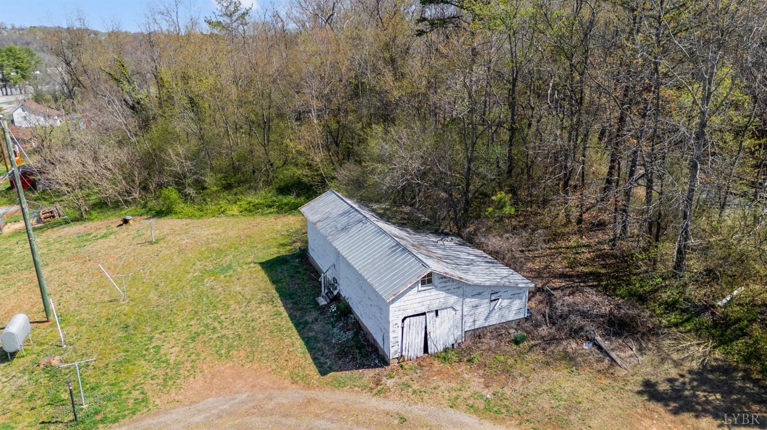 501 West Spencer Road Hurt, VA 24563 - Photo 51 of 55 a view of a yard with large trees