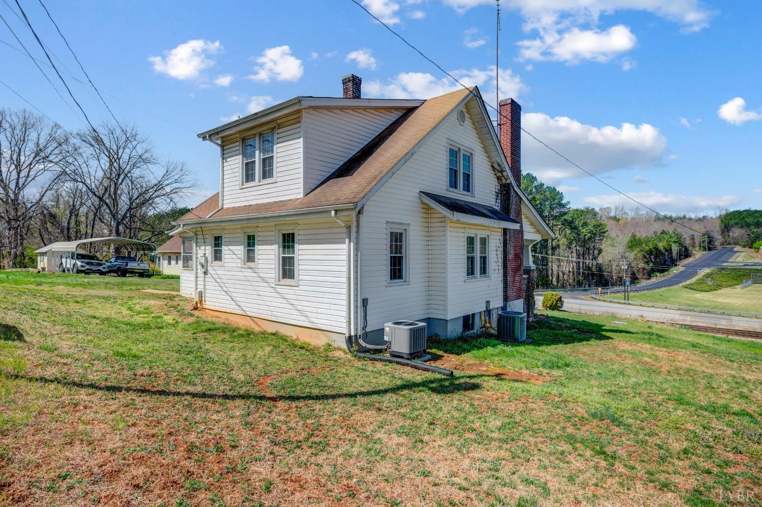 501 West Spencer Road Hurt, VA 24563 - Photo 6 of 55 a view of house with a yard