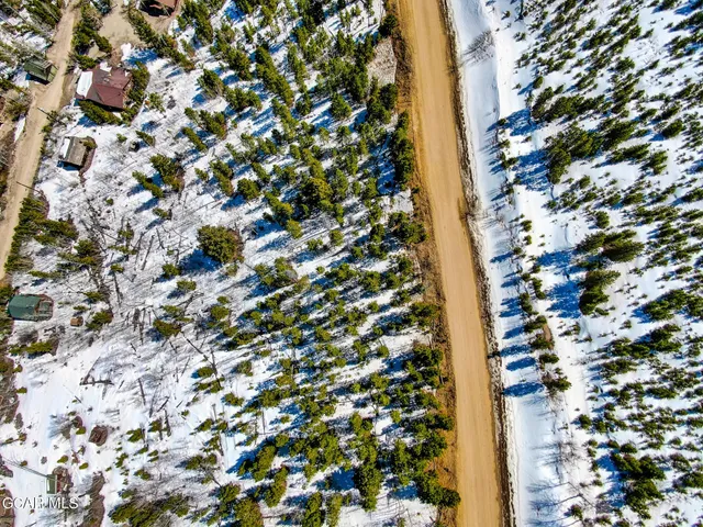 a view of a city with mountains in the background