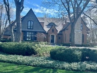 Undisclosed Address Lake Forest, IL 60045 - Photo 1 of 1 a front view of a house with a yard