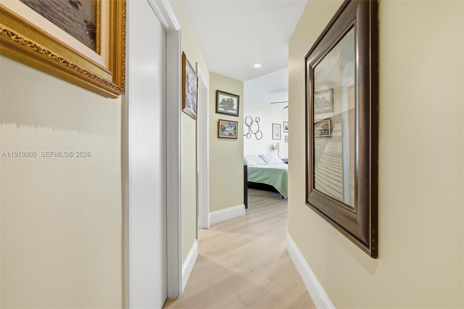 888 Brickell Key Drive, Unit 1903 Miami, FL 33131 - Photo 16 of 38 a view of a hallway with closet and a bathroom