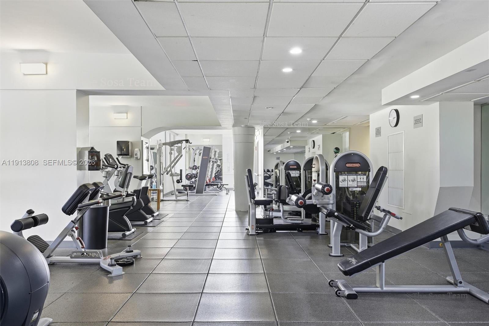 888 Brickell Key Drive, Unit 1903 Miami, FL 33131 - Photo 33 of 38 a view of a room with gym equipment