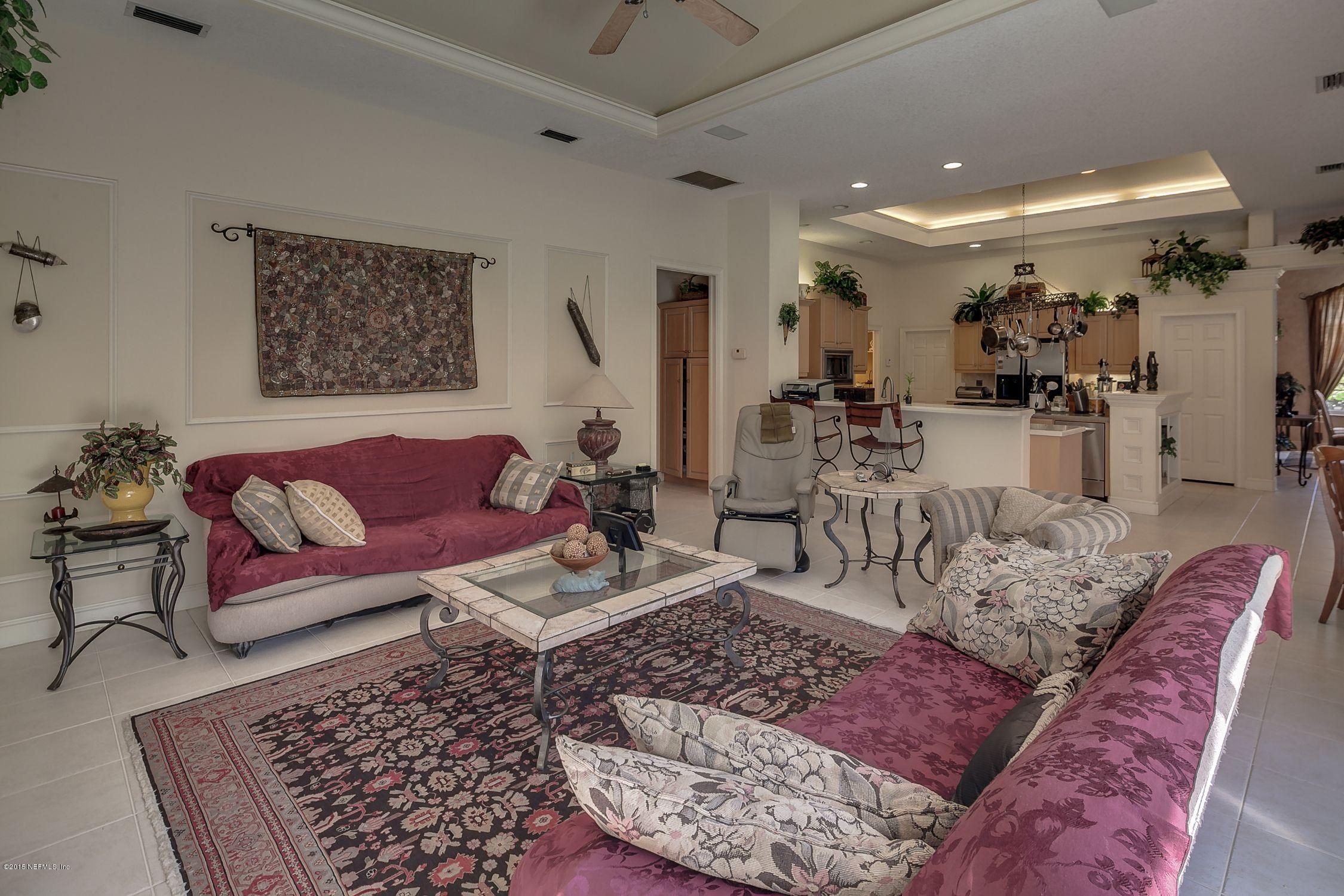 137 Pinehurst Pointe Drive St. Augustine, FL 32092 - Photo 12 of 48 a living room with furniture and wooden floor