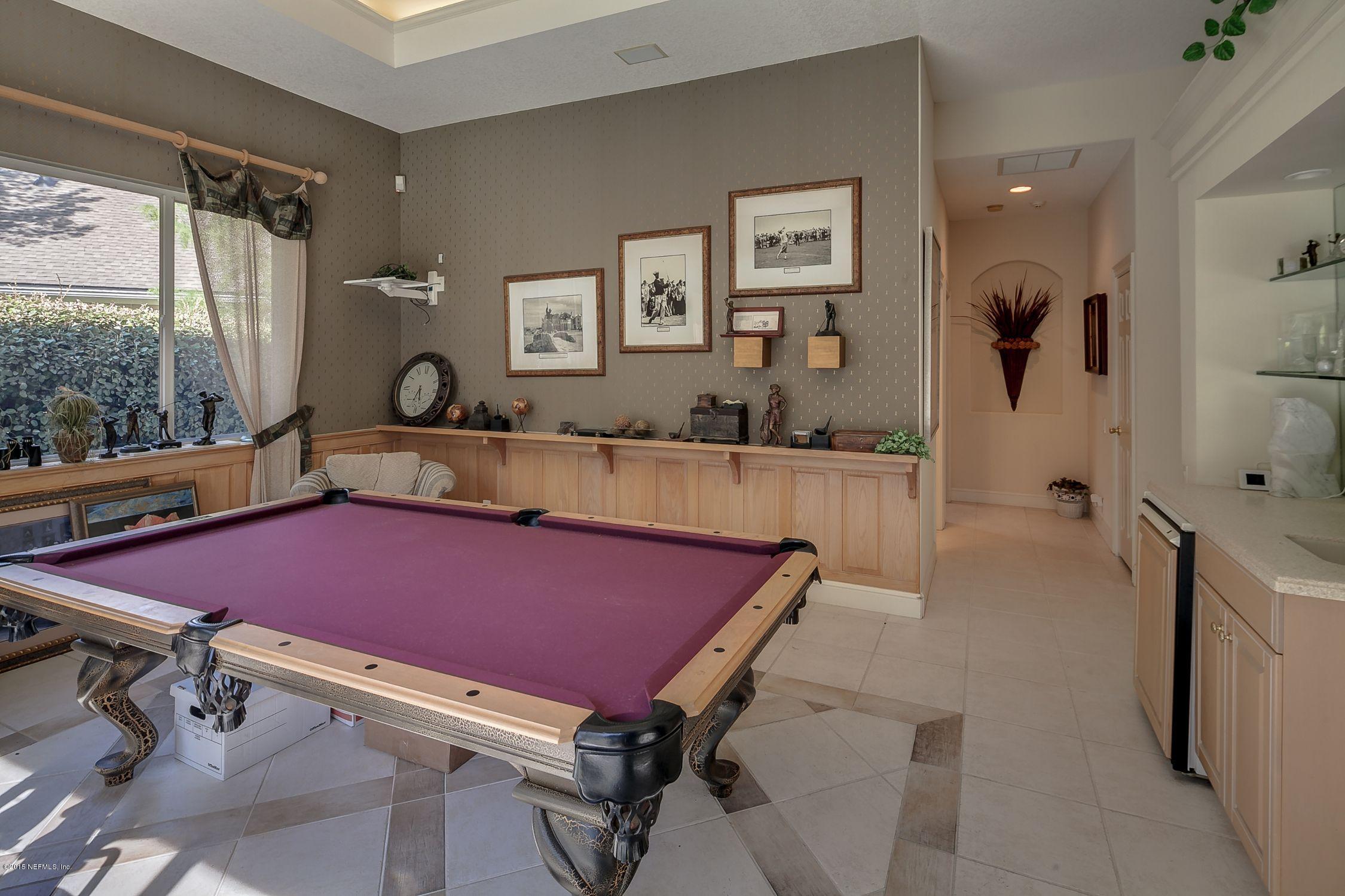 137 Pinehurst Pointe Drive St. Augustine, FL 32092 - Photo 14 of 48 a room with pool table and windows