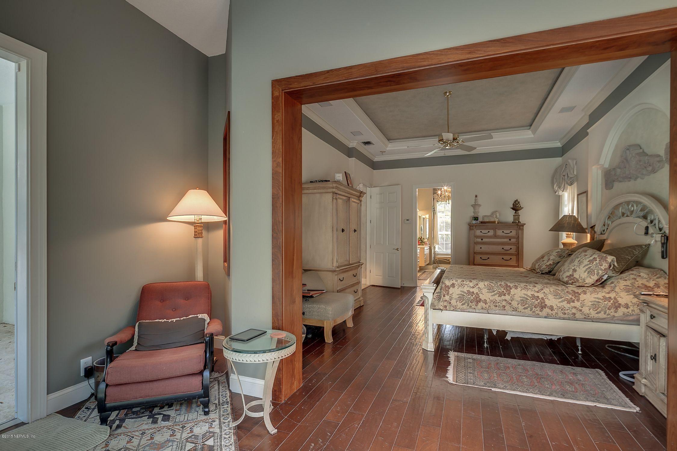 137 Pinehurst Pointe Drive St. Augustine, FL 32092 - Photo 18 of 48 a living room with furniture and wooden floor