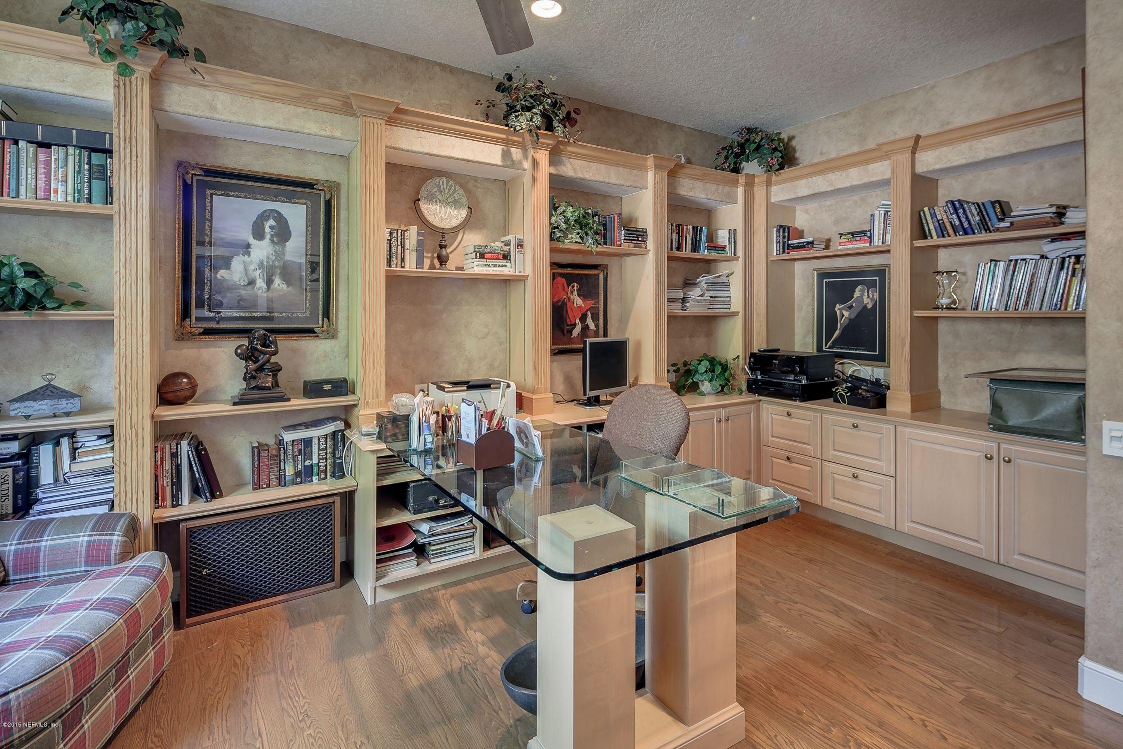 137 Pinehurst Pointe Drive St. Augustine, FL 32092 - Photo 31 of 48 a living room with stainless steel appliances furniture and a kitchen view