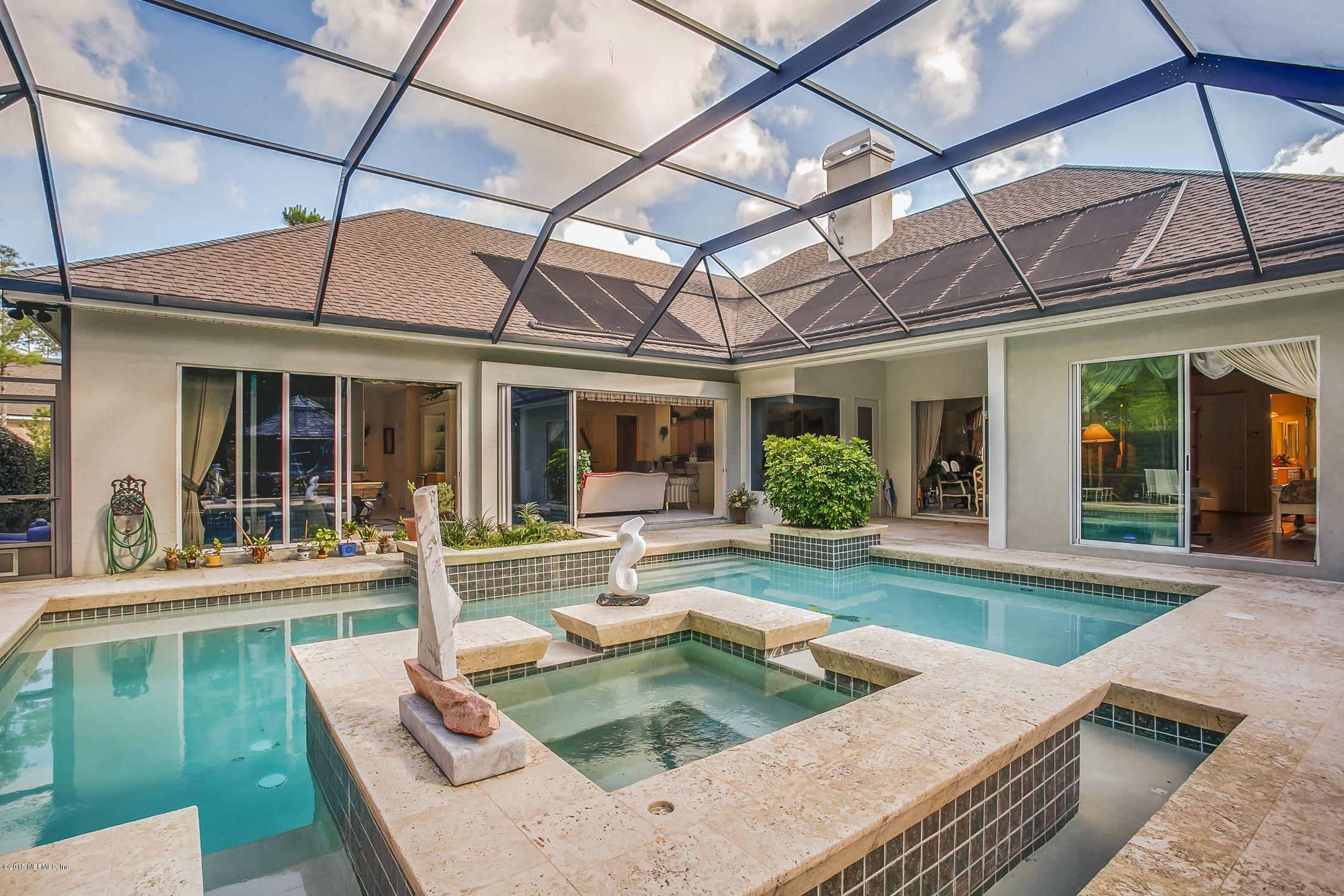 137 Pinehurst Pointe Drive St. Augustine, FL 32092 - Photo 33 of 48 a view of house with swimming pool and outdoor seating
