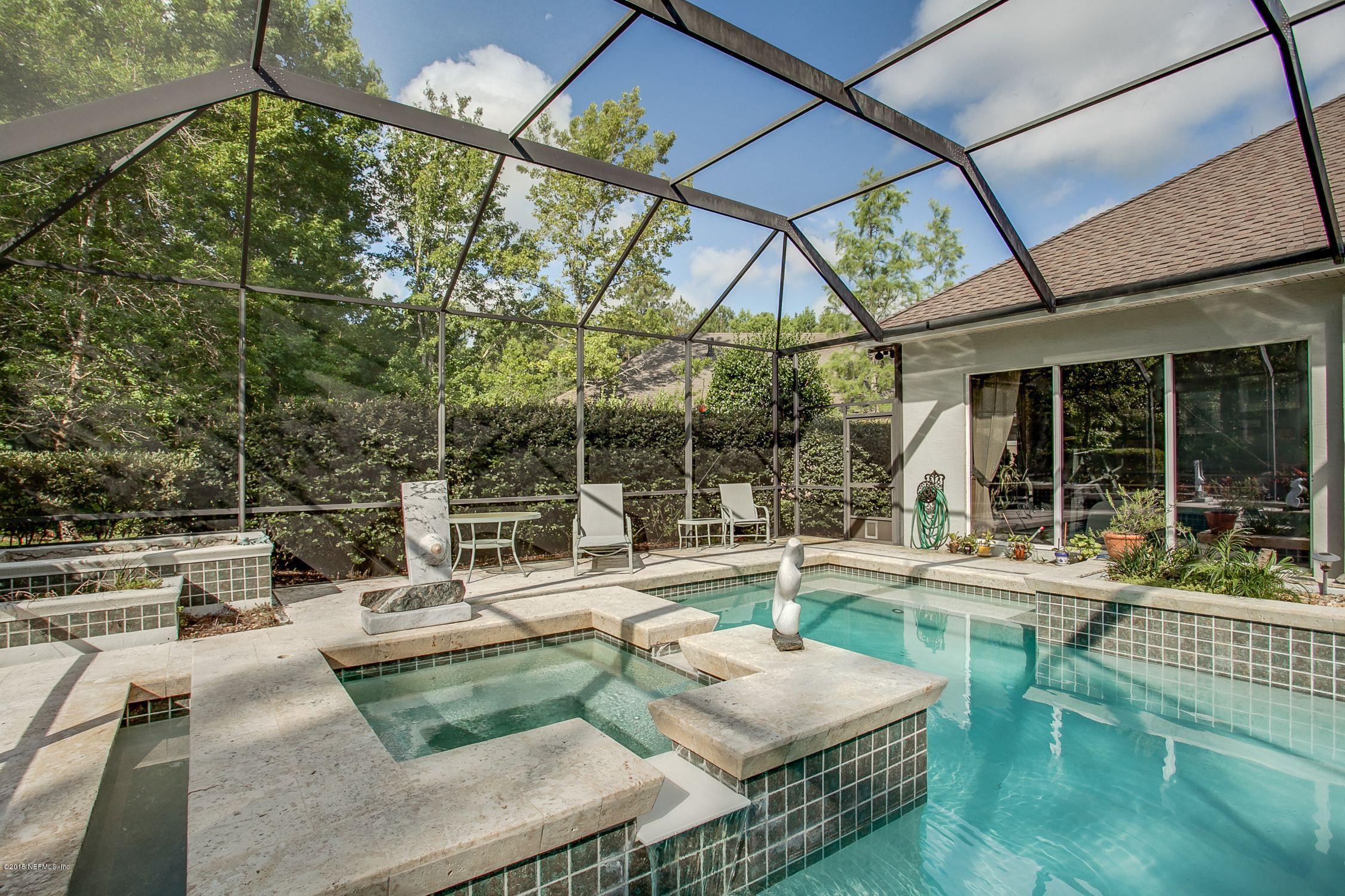 137 Pinehurst Pointe Drive St. Augustine, FL 32092 - Photo 34 of 48 a view of house with swimming pool and outdoor seating
