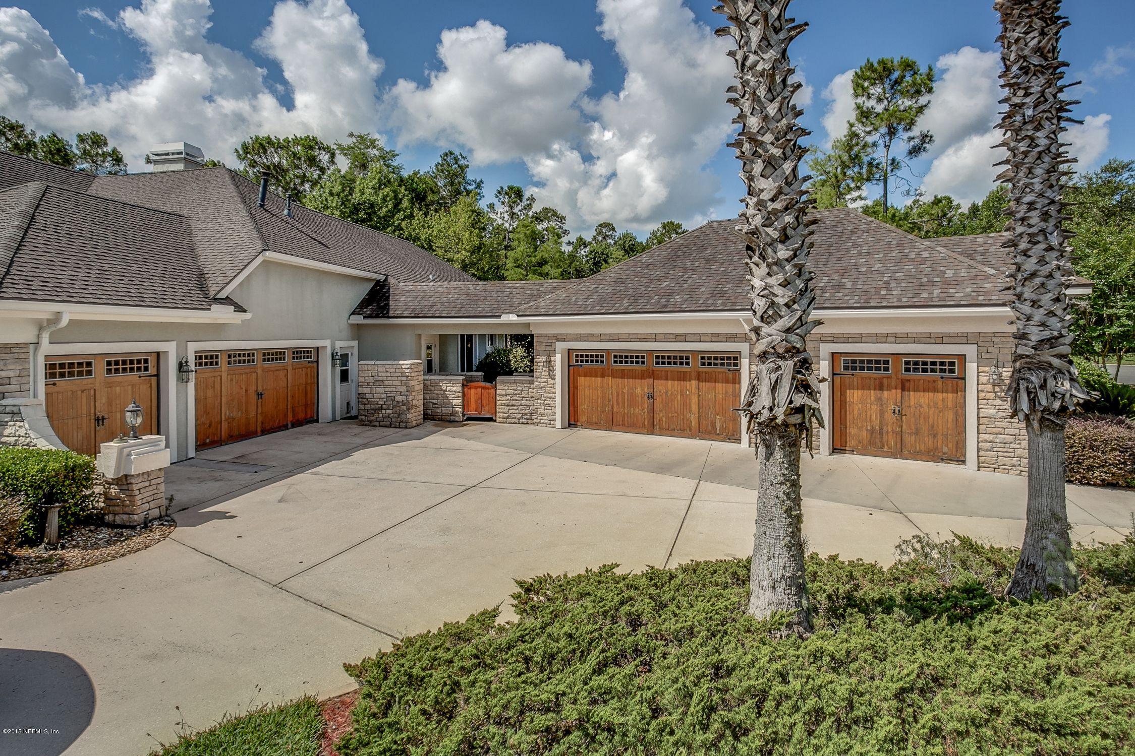 137 Pinehurst Pointe Drive St. Augustine, FL 32092 - Photo 37 of 48 a front view of a house with garden