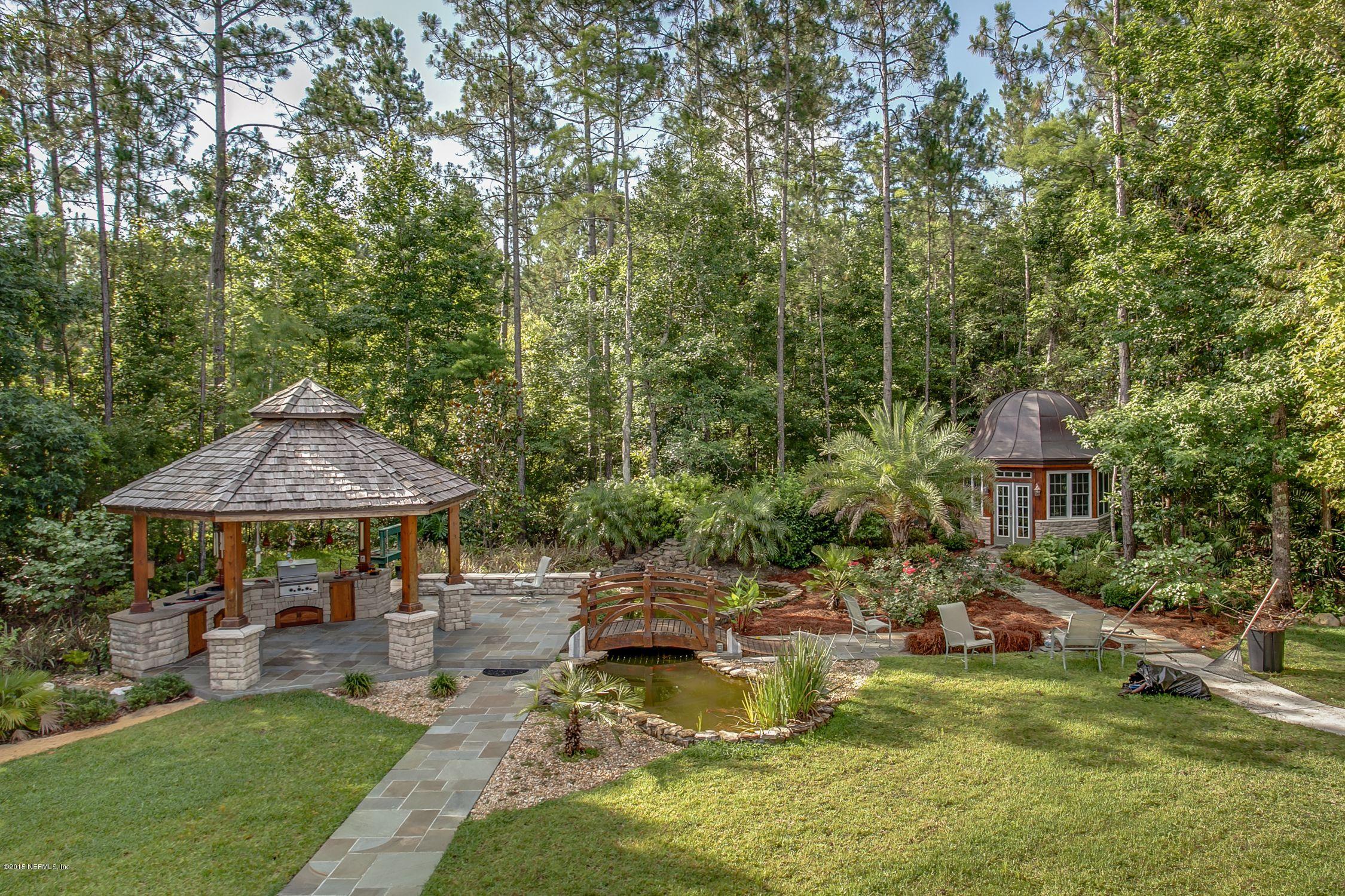 137 Pinehurst Pointe Drive St. Augustine, FL 32092 - Photo 43 of 48 a view of a house with swimming pool and sitting area