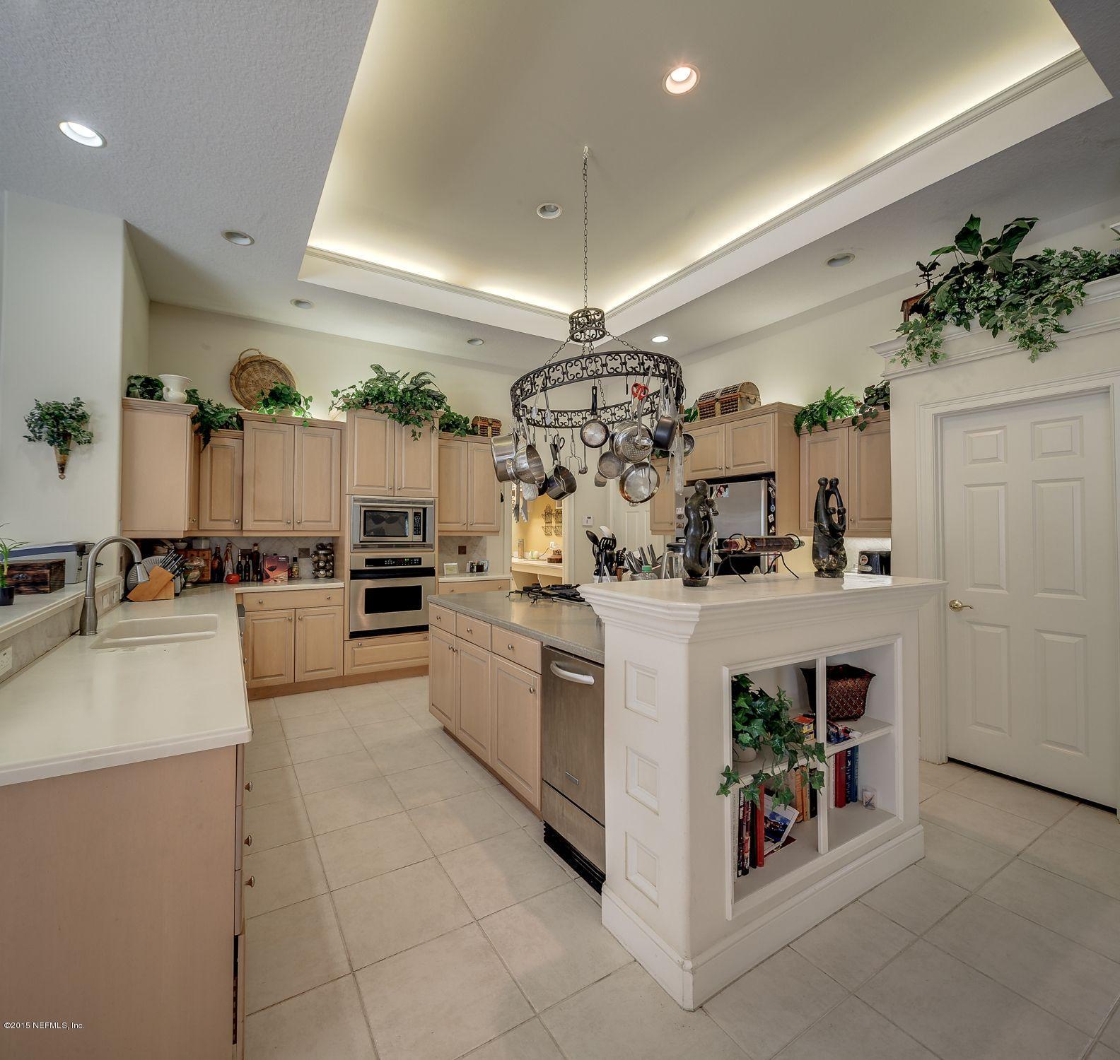 137 Pinehurst Pointe Drive St. Augustine, FL 32092 - Photo 9 of 48 a kitchen with sink and cabinets