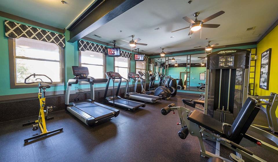 3645 Habersham Road Northeast, Unit 1B1BA Atlanta, GA 30305 - Photo 5 of 16 a view of a room with gym equipment
