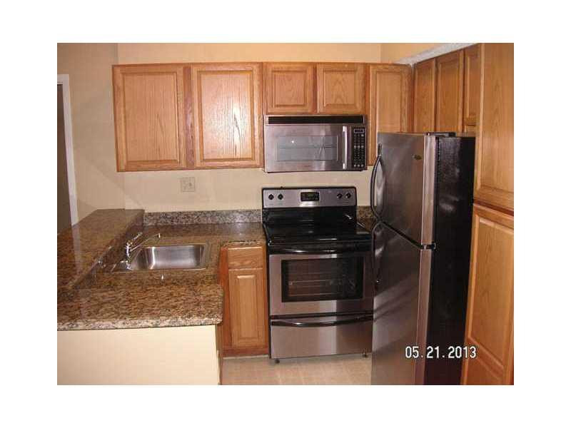 721 Lyons Road, Unit 15205 Coconut Creek, FL 33063 - Photo 3 of 14 Kitchen