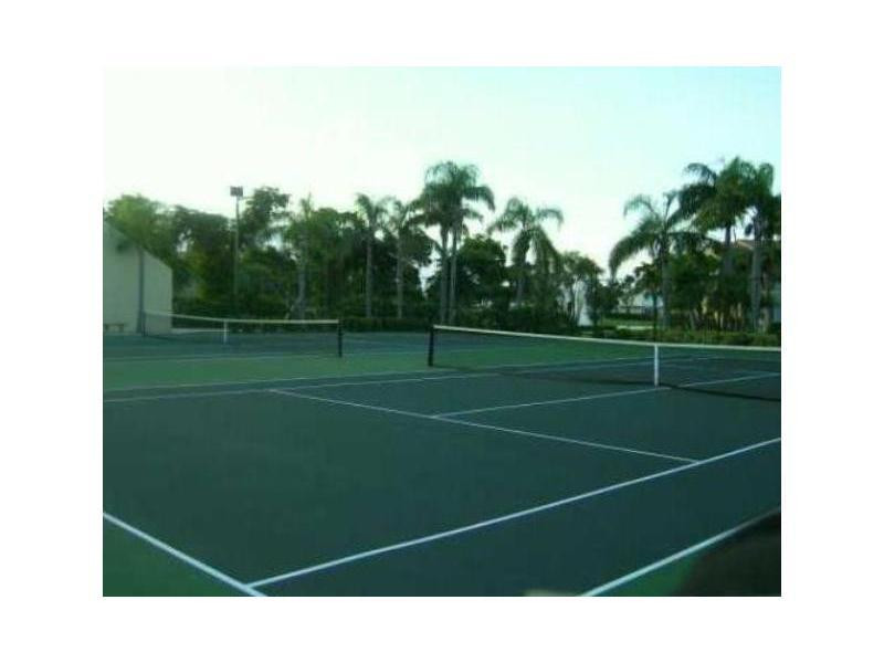 721 Lyons Road, Unit 15205 Coconut Creek, FL 33063 - Photo 9 of 14 Tennis Court