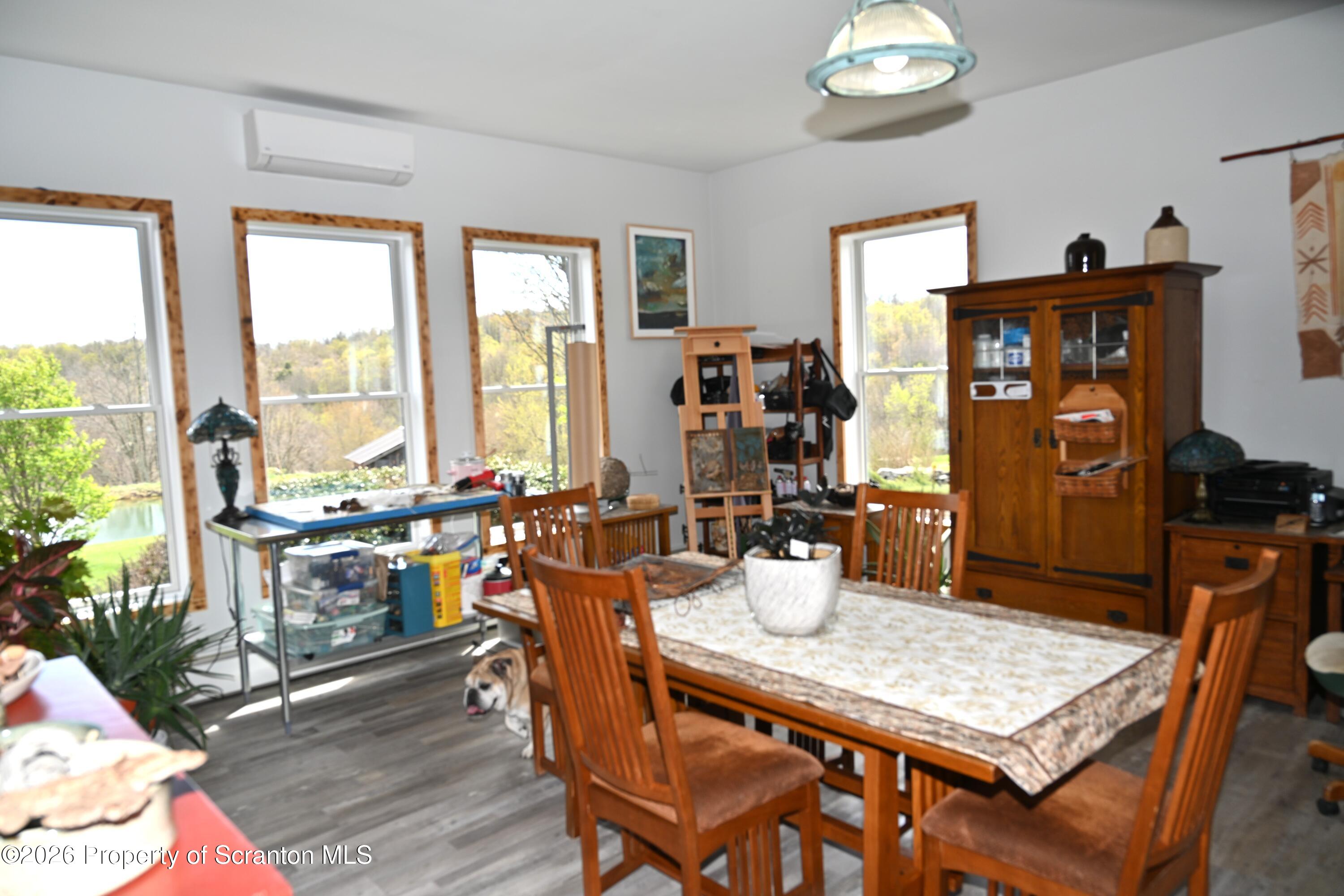512-318 Johnson Pond Road Montrose, PA 18801 - Photo 31 of 89 a view of a dining room with furniture window and outside view