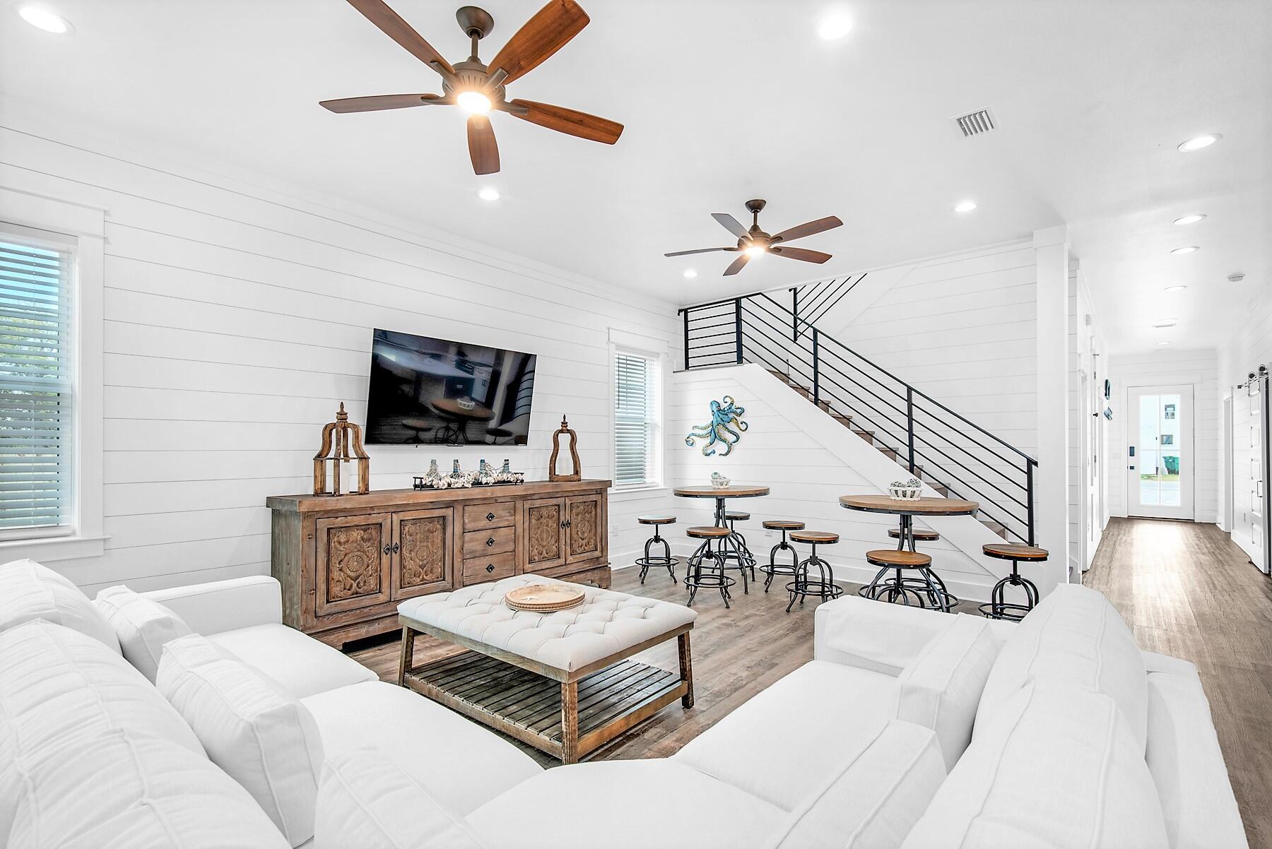 4541 Luke Avenue Destin, FL 32541 - Photo 2 of 49 a living room with furniture and a flat screen tv