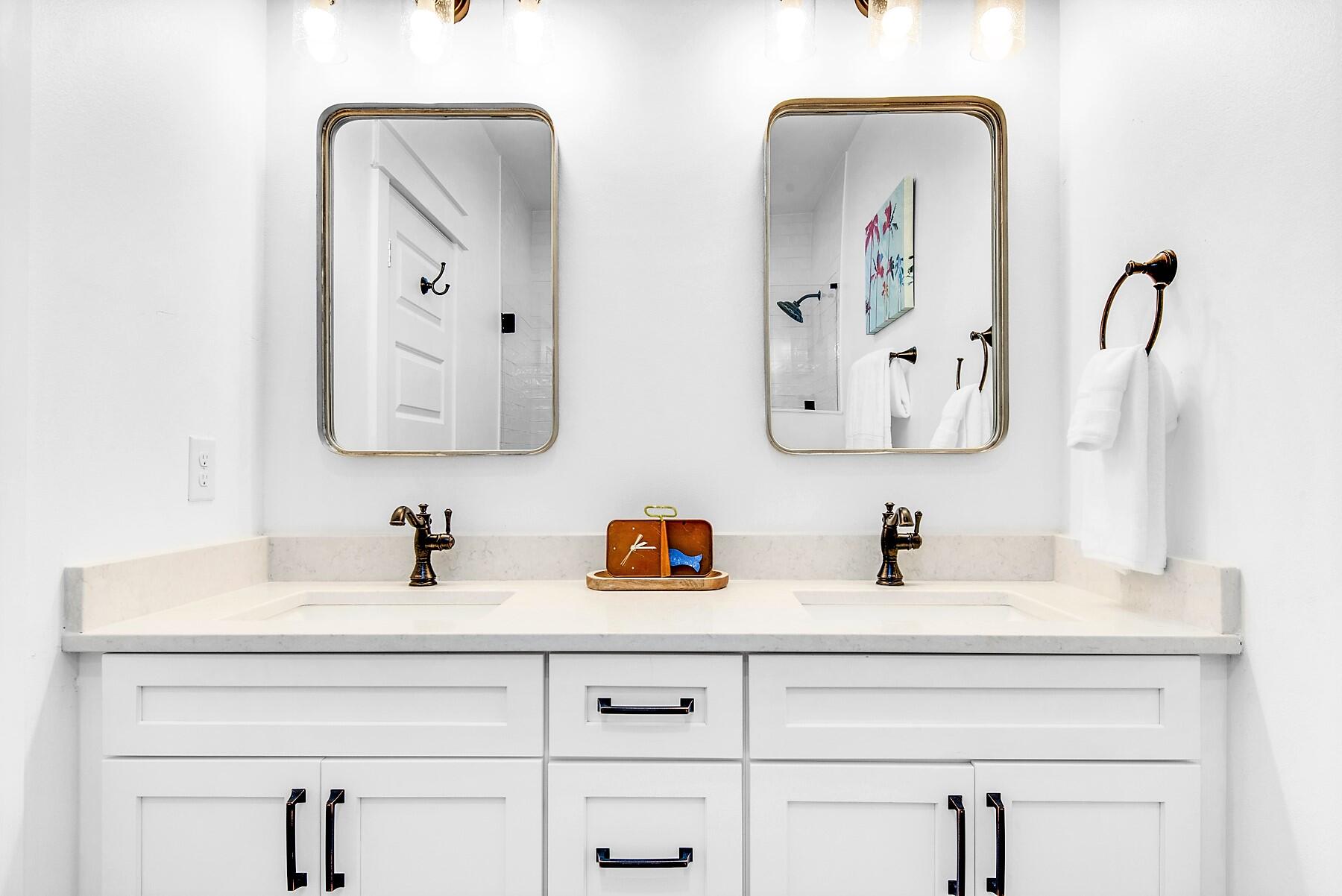 4541 Luke Avenue Destin, FL 32541 - Photo 42 of 49 a bathroom with vanity two mirror and