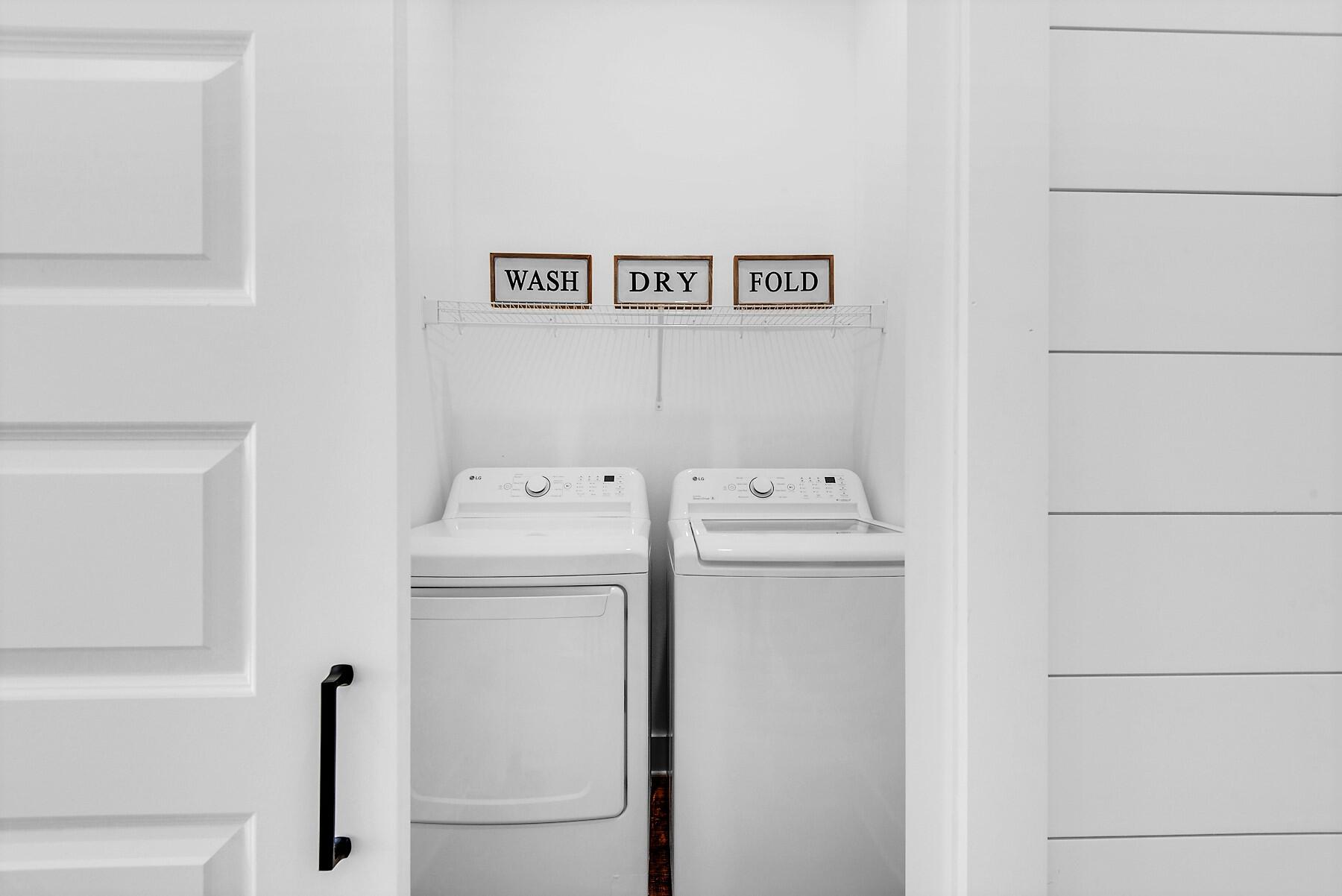 4541 Luke Avenue Destin, FL 32541 - Photo 44 of 49 a utility room with dryer and washer