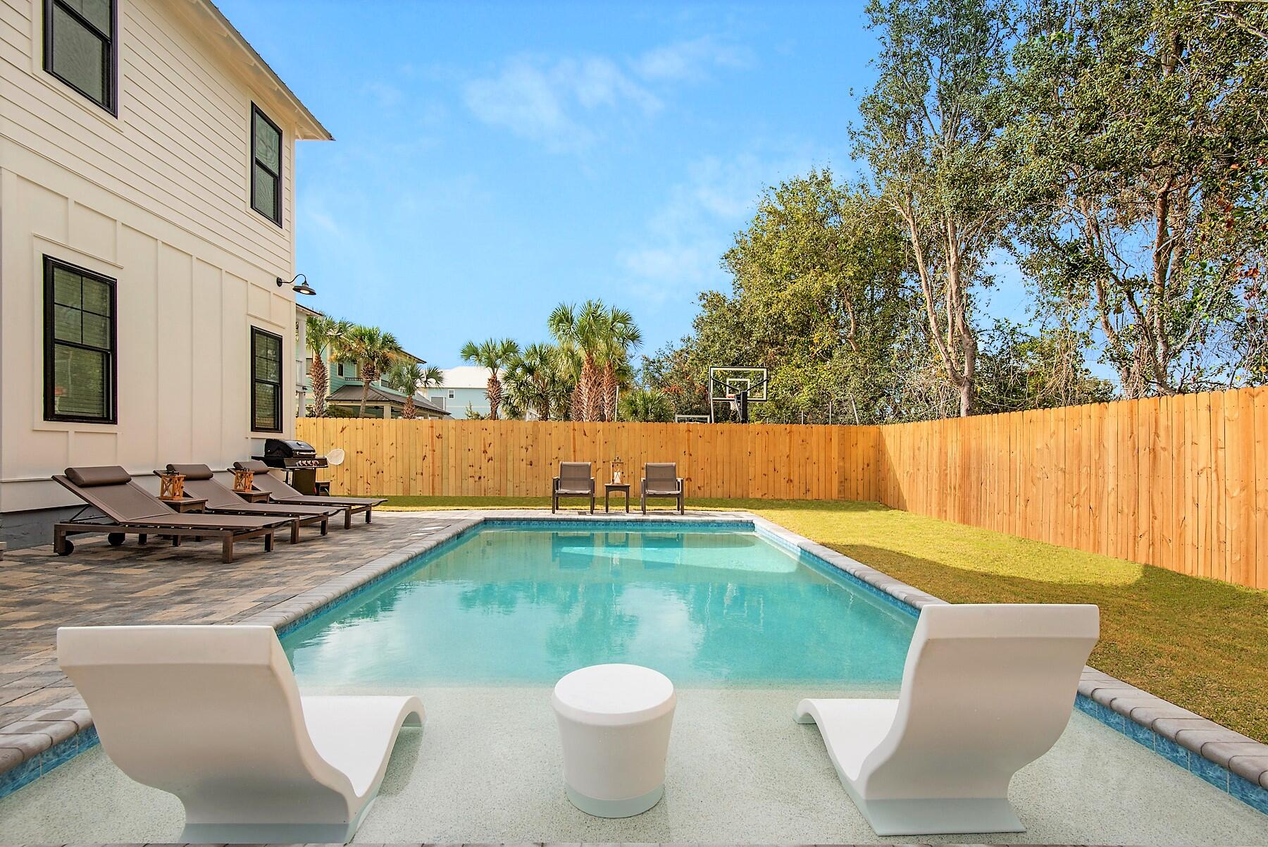 4541 Luke Avenue Destin, FL 32541 - Photo 45 of 49 a view of swimming pool with seating space