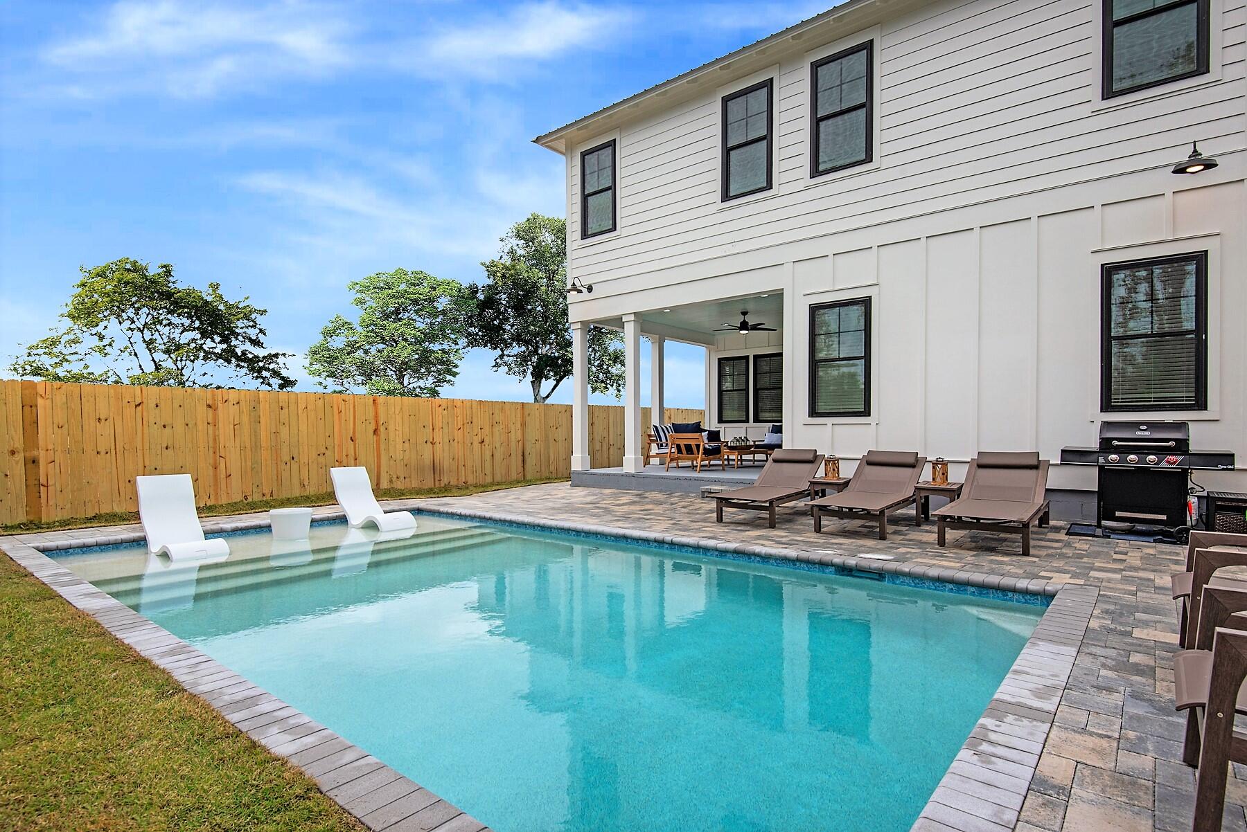 4541 Luke Avenue Destin, FL 32541 - Photo 46 of 49 a view of swimming pool with outdoor seating